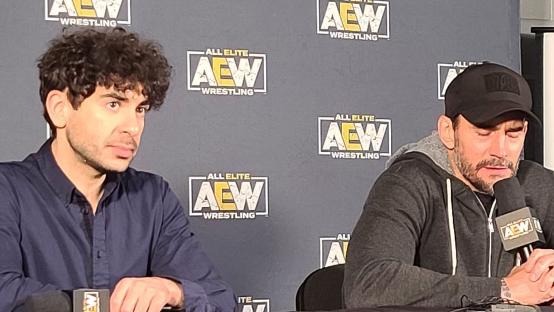 Tony Khan and CM Punk at the AEW Double or Nothing 2022 media scrum