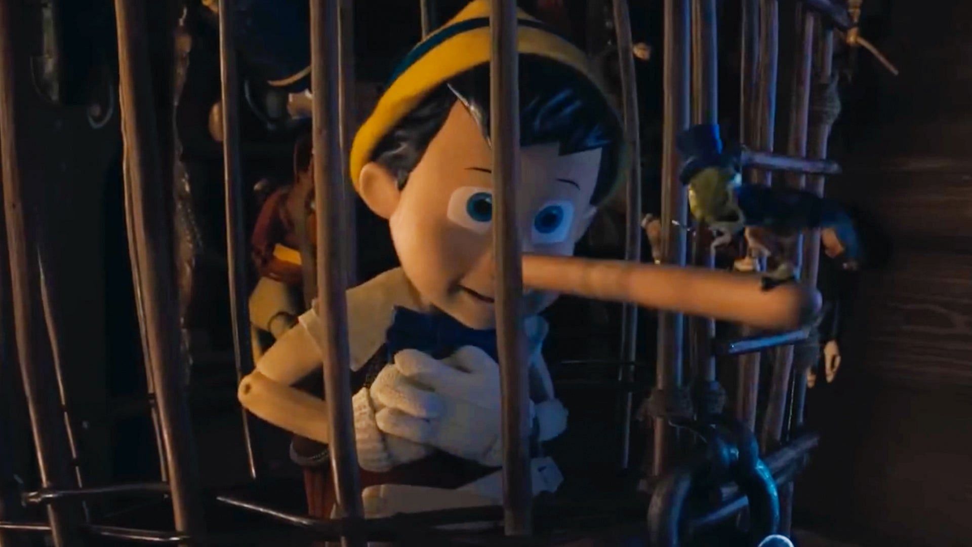 The puppet is trapped in a cage (Image via Disney)