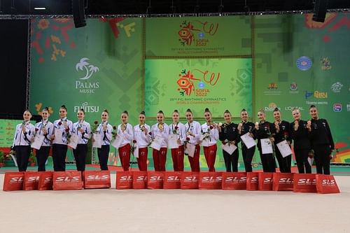 Group All-Around Medal Ceremony: from L to R: Israel with silver, Bulgaria with gold and Spain with bronze (Image via Xinhua/Lin Hao)