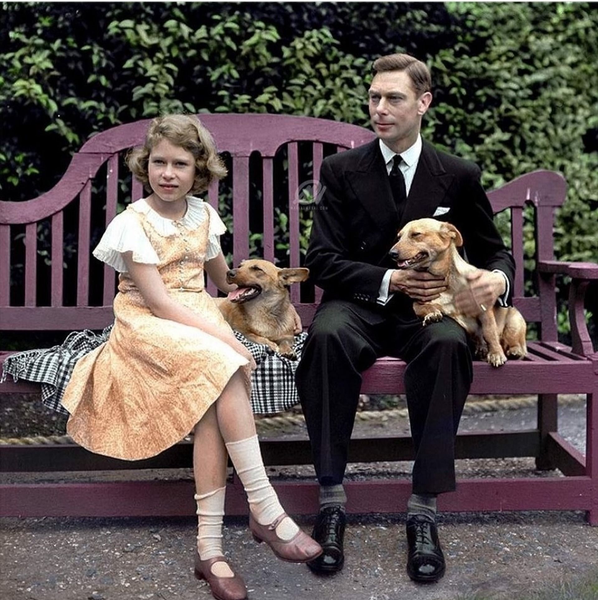 Young Elizabeth with King George VI with her dog. (Image via Twitter)