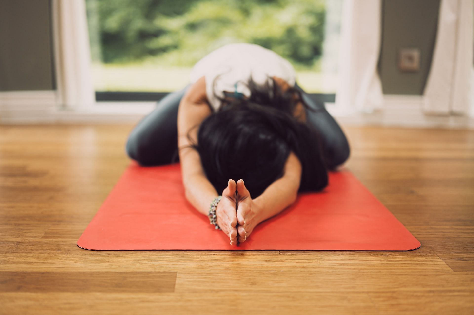 Yoga exercises help prevent gut problems. (Photo via unsplash/Conscious Design)