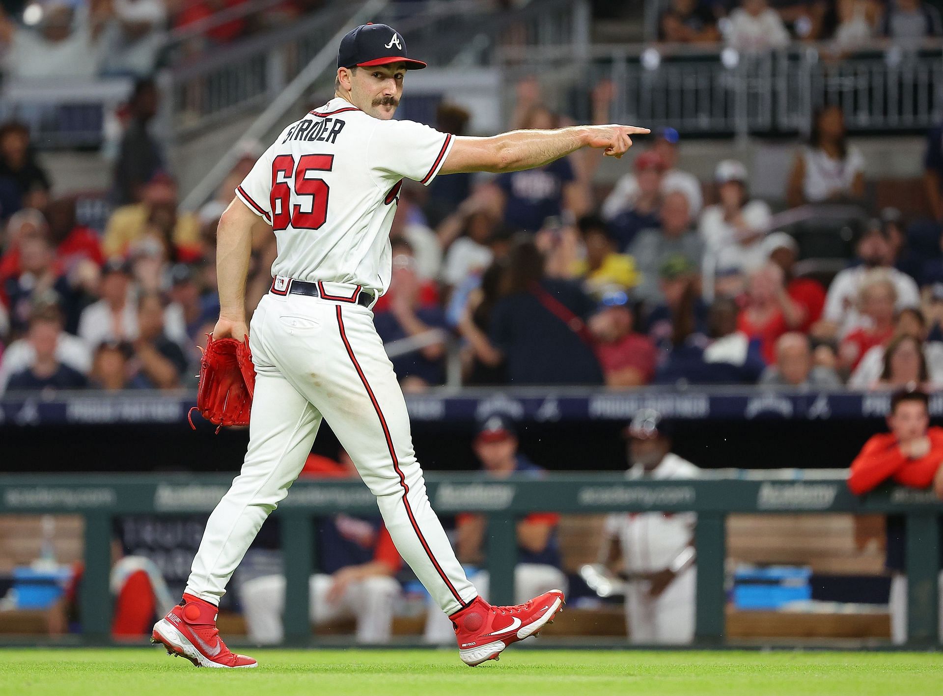 Spencer Strider #65 of the Atlanta Braves reacts as he strikes out