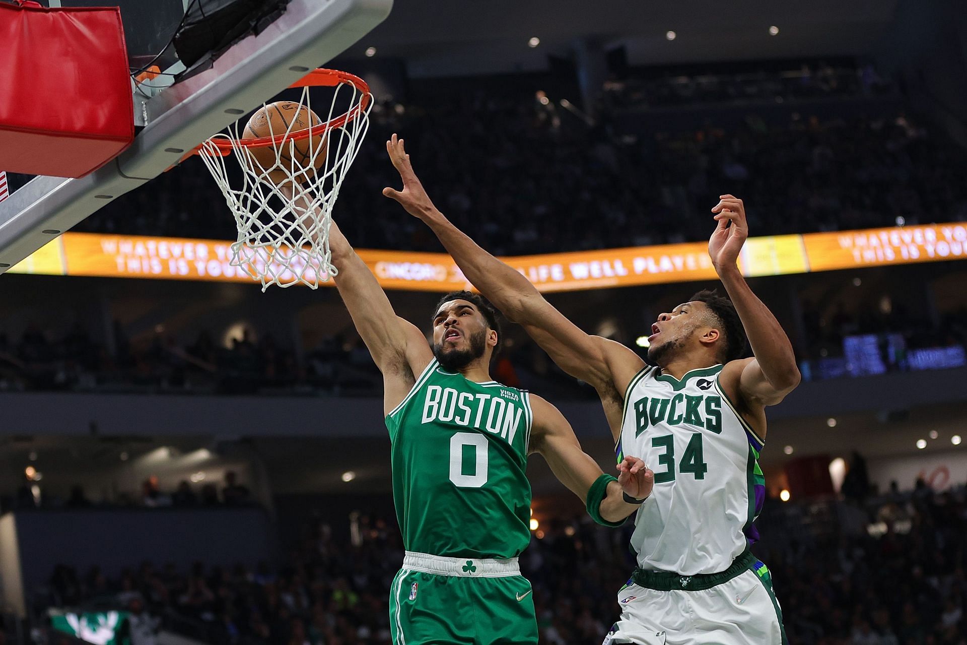 Jayson Tatum of the Boston Celtics and Giannis Antetokounmpo of the Milwaukee Bucks