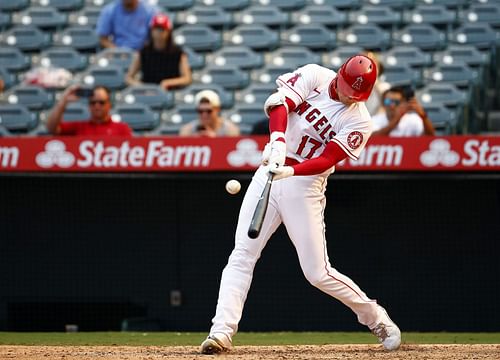 Shohei Ohtani #17 of the Los Angeles Angels hits a home run against the Detroit Tigers in the seventh inning