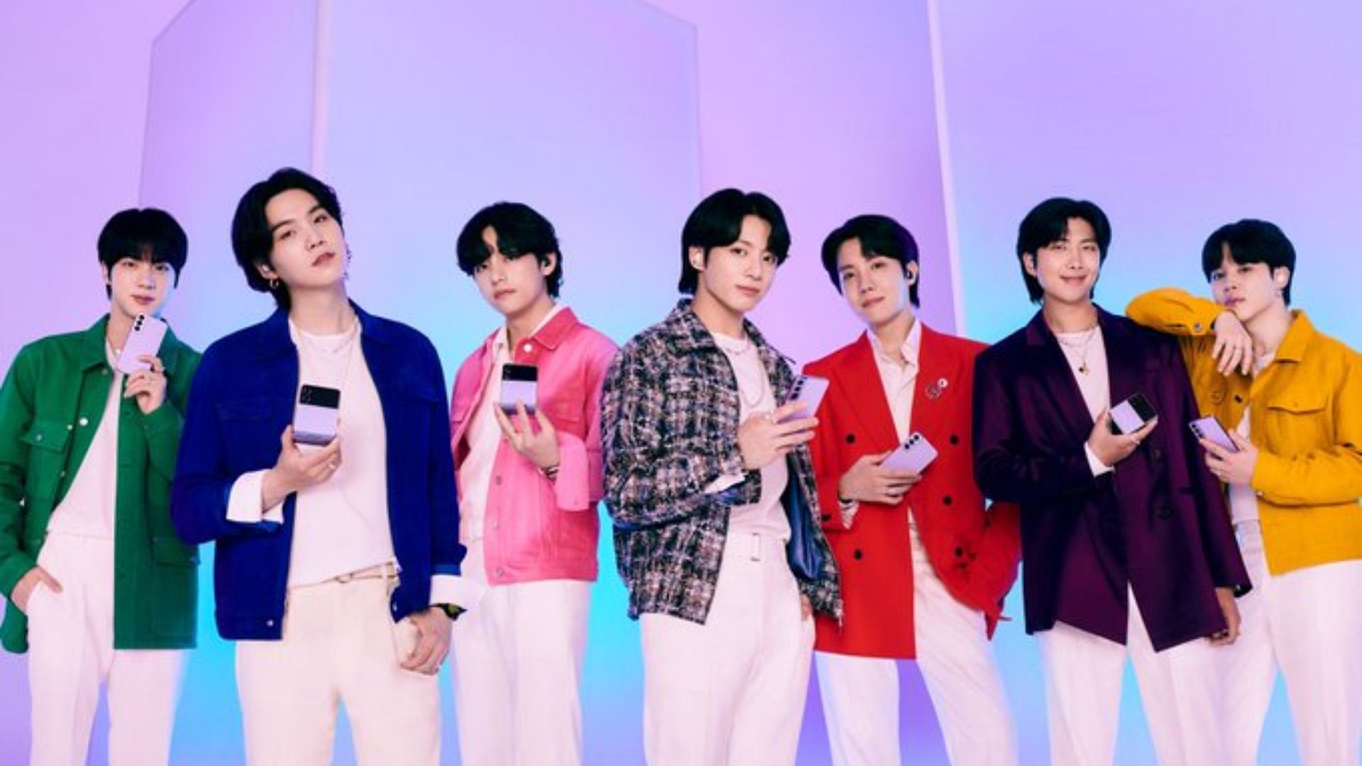 BTS pose for the Samsung commerical (Image via Twitter/@FundsForBTS_UK)