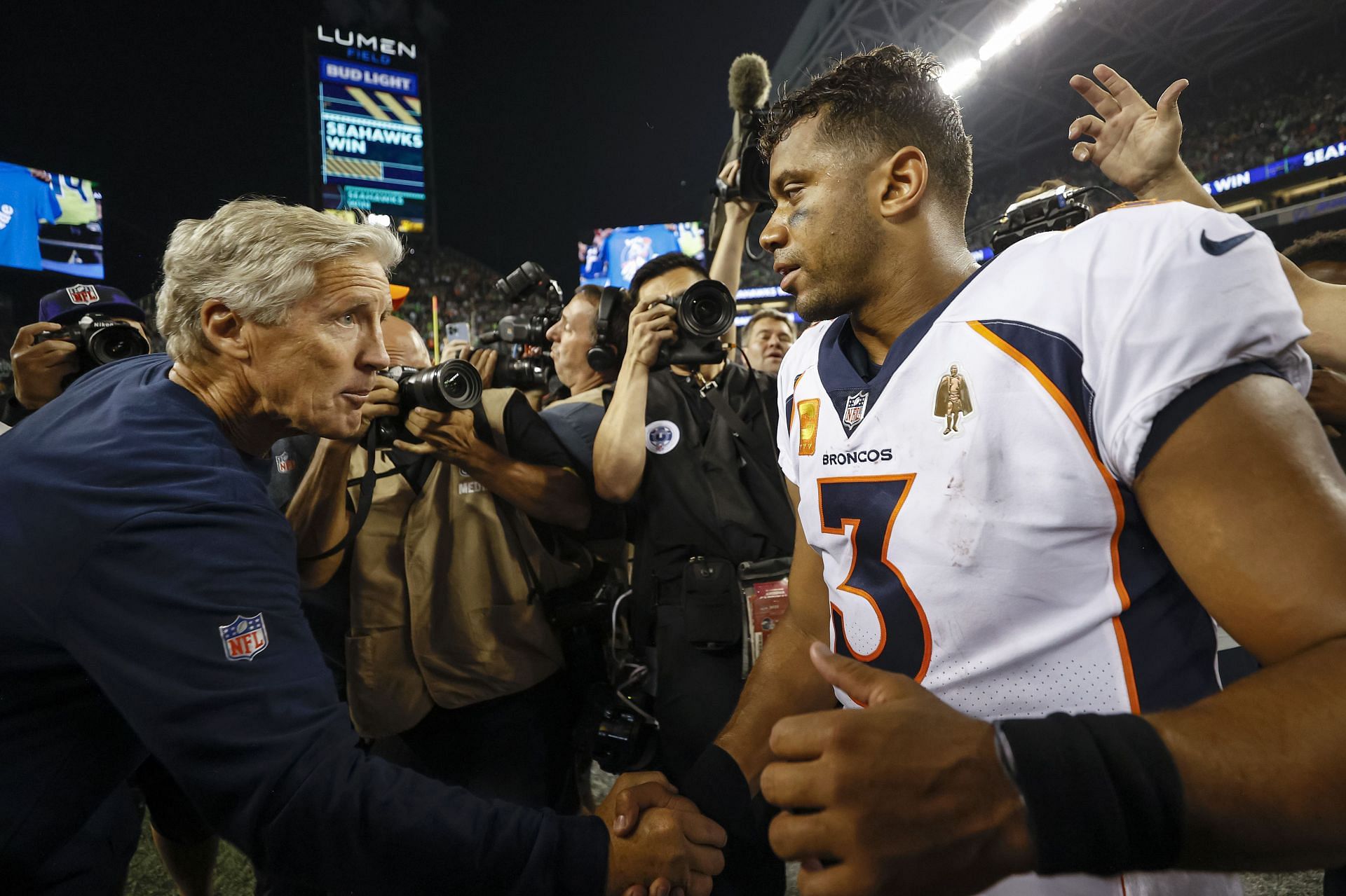 No. 3 with his former mentor Pete Carroll