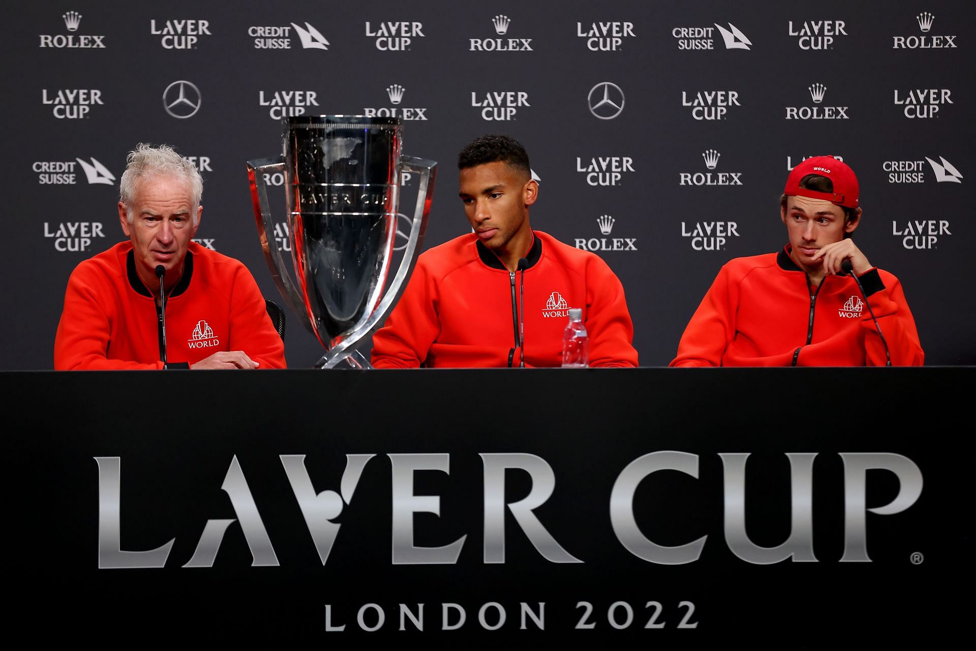 John McEnroe (L), Felix Auger-Aliassime, and Alex de Milnaur