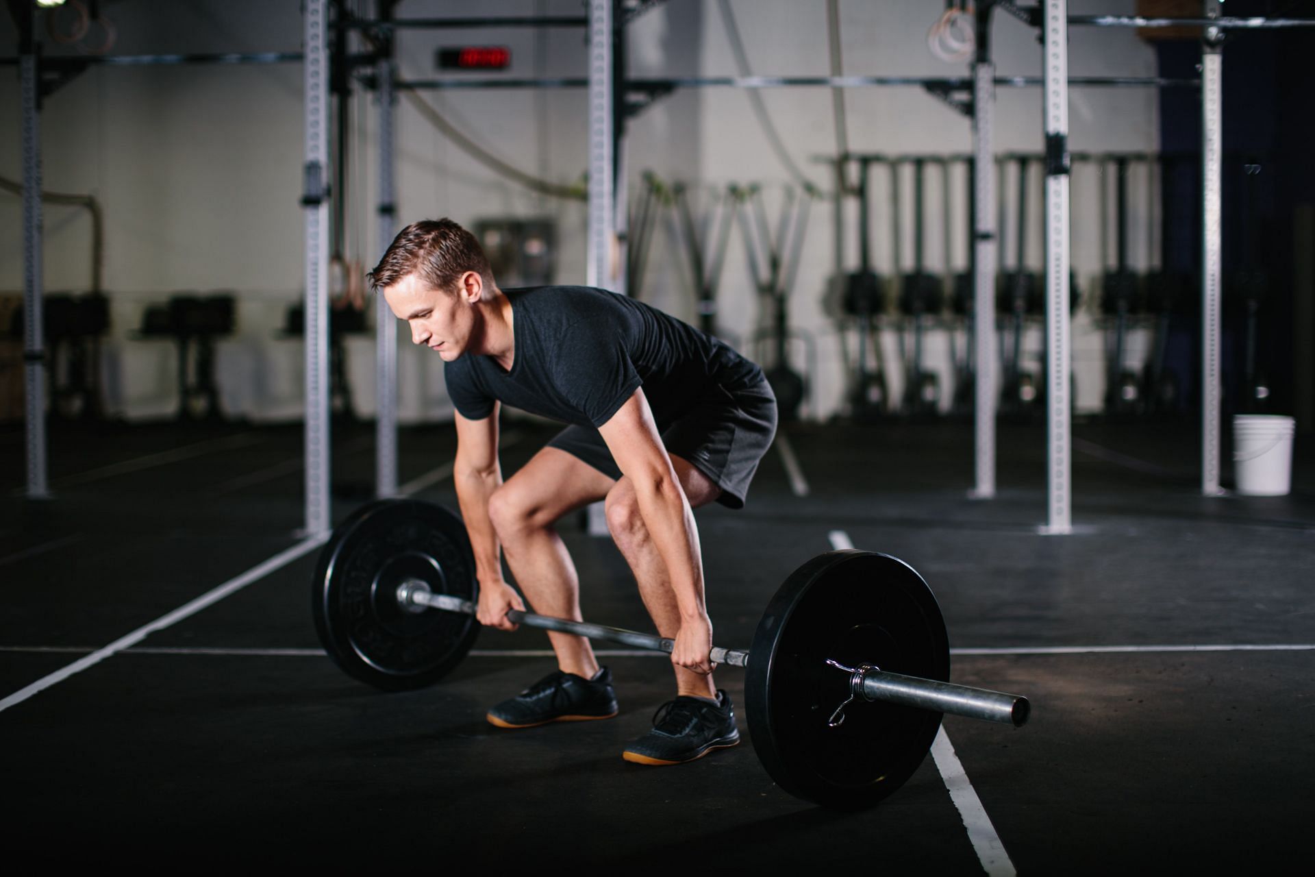 Strength, increased muscular growth, fat loss, and power can all be obtained with barbell strength training. (Image via Unsplash/ Mariah Krafft)
