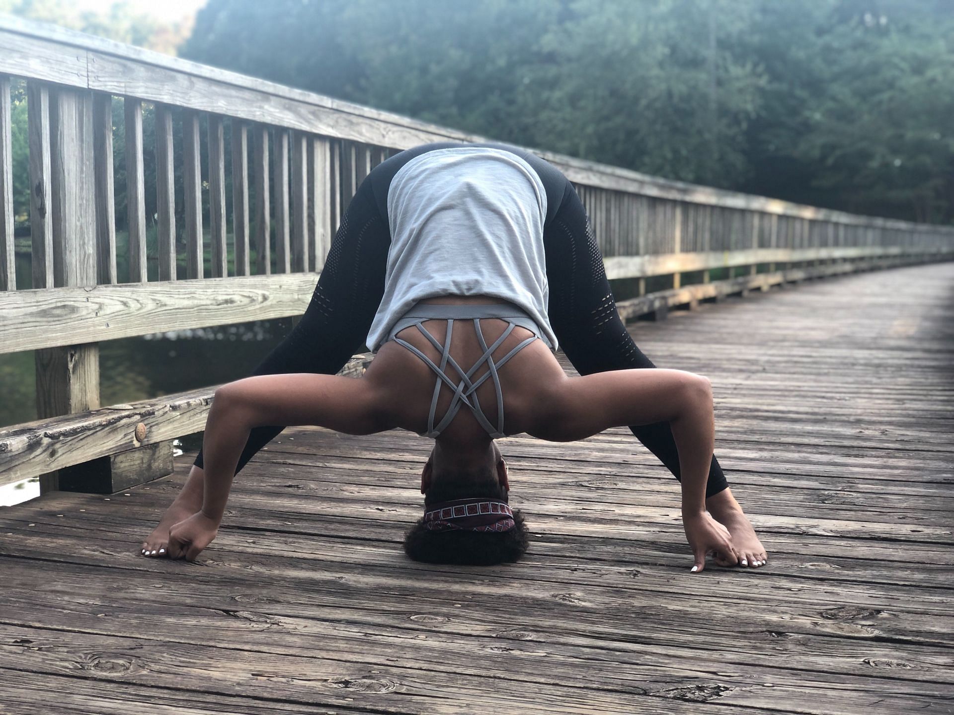 Lower back exercises play an important role in strengthening your back as well as alleviating back pain. (Image via Unsplash/ Liveology Yoga Magazine)