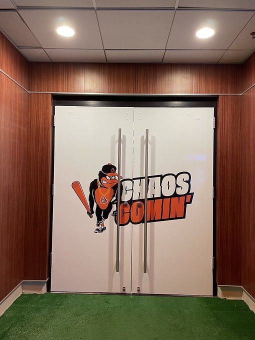 The visiting players walk by the door on the way to their batting cage We  need this on a shirt ASAP! - Baltimore Orioles foreshadow stark warning to  rival clubs at the