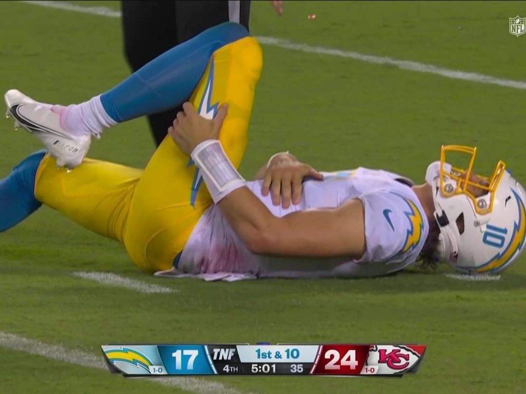 Justin Herbert on the turf after rib injury vs. Chiefs. Source: NFL on CBS