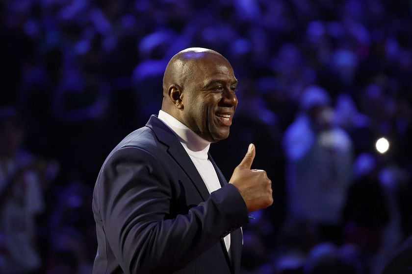 Magic Johnson finds Worthy early in transition leading to a