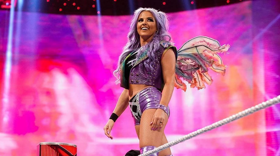 Candice LaRae posing for the crowd during her debut on WWE RAW