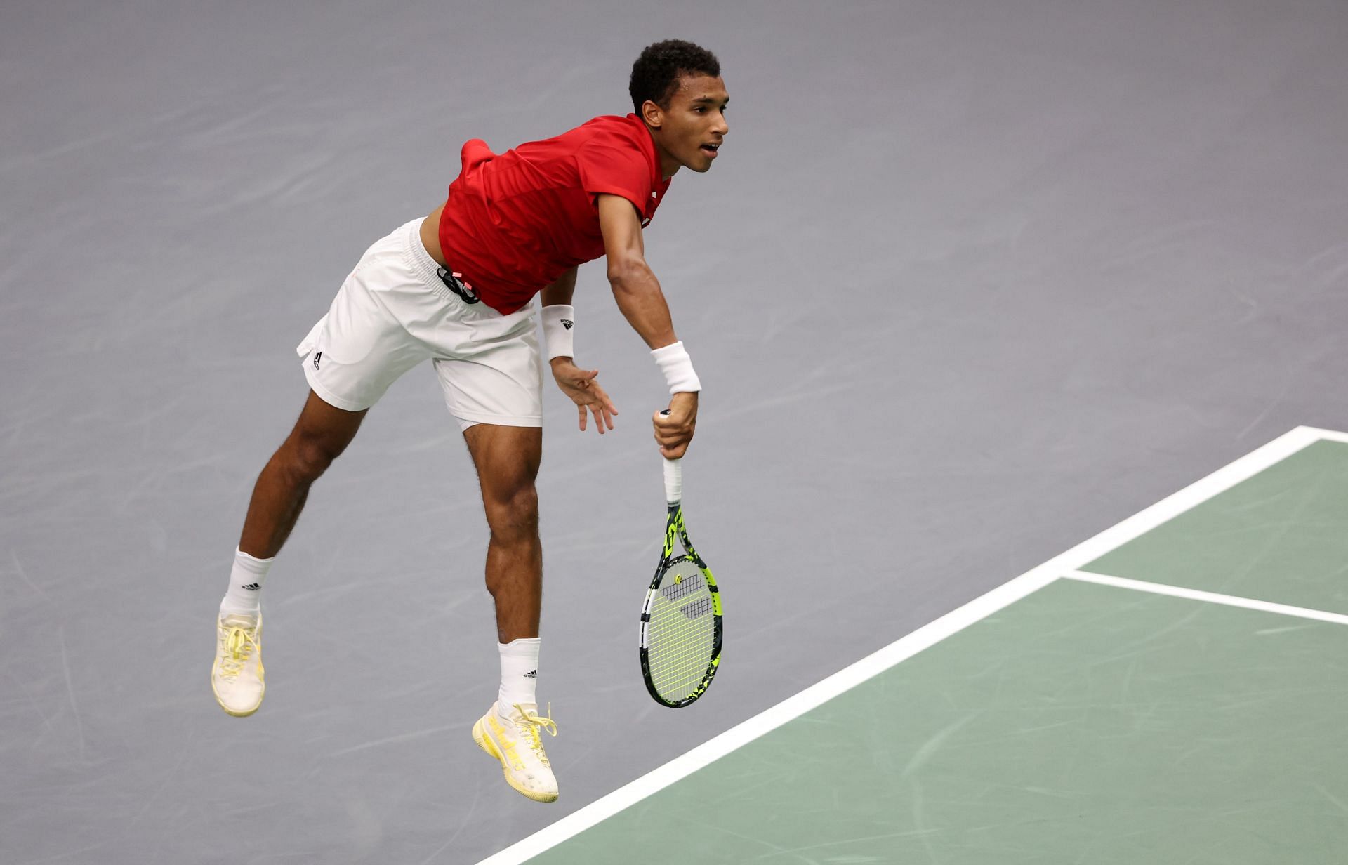 Felix Auger Aliassime in action at Davis Cup. Photo by Clive Brunskill/Getty Images