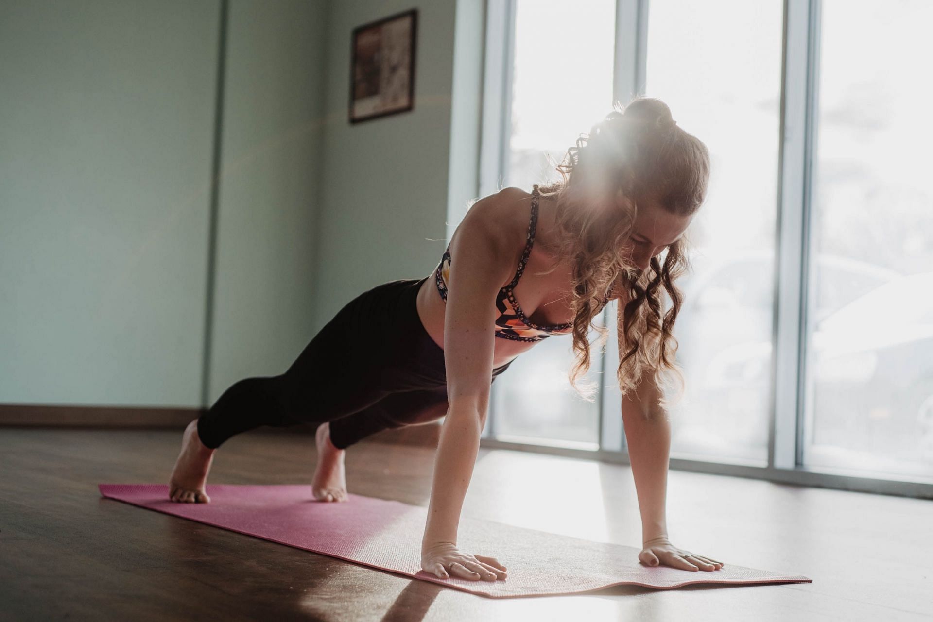 Your efforts to increase triceps strength will improve manifolds with Yoga exercises. (Image via Unsplash/ Olivia Bauso)