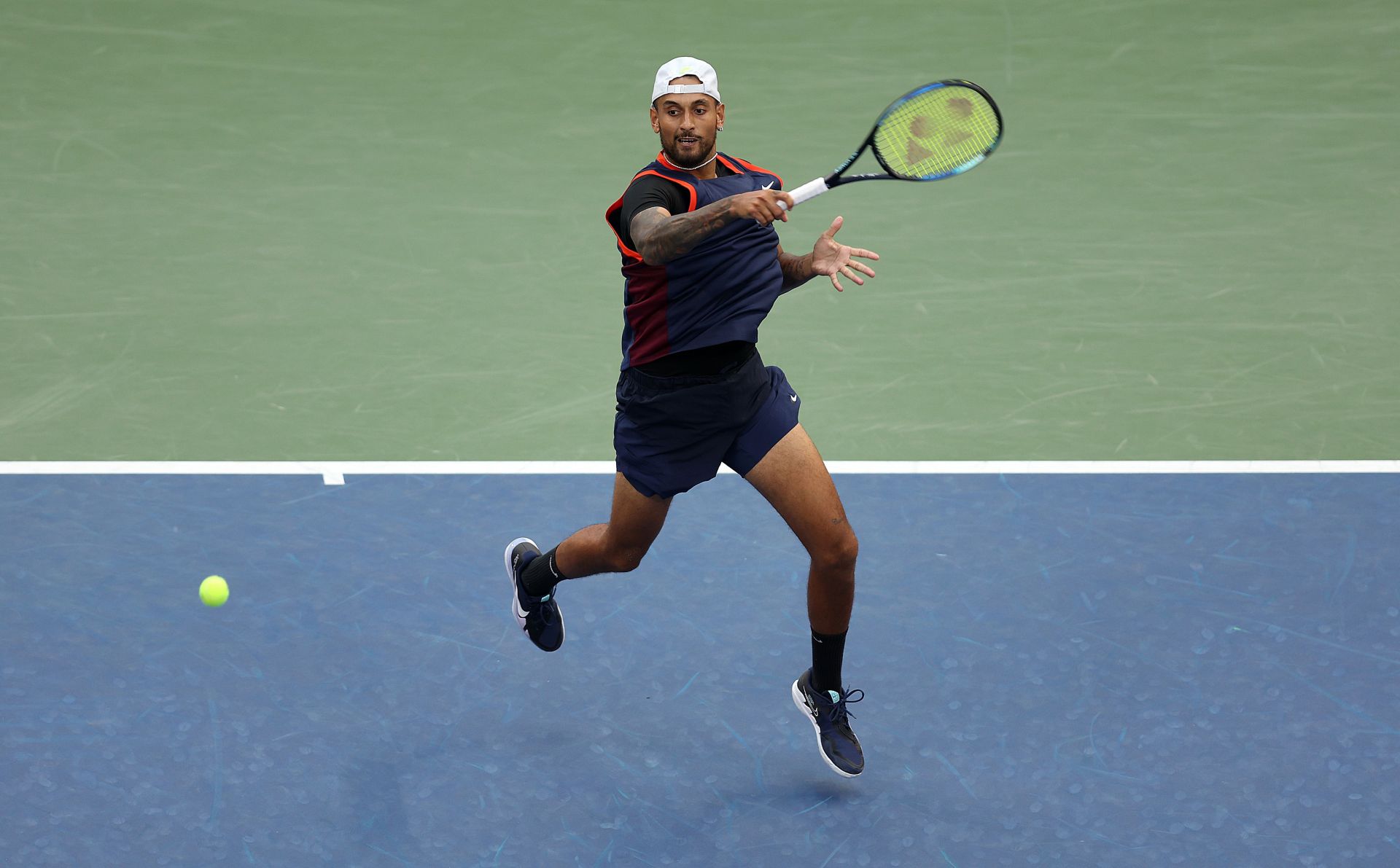 Nick Kyrgios of Australia in action against Benjamin Bonzi of France at the 2022 US Open - Day 3