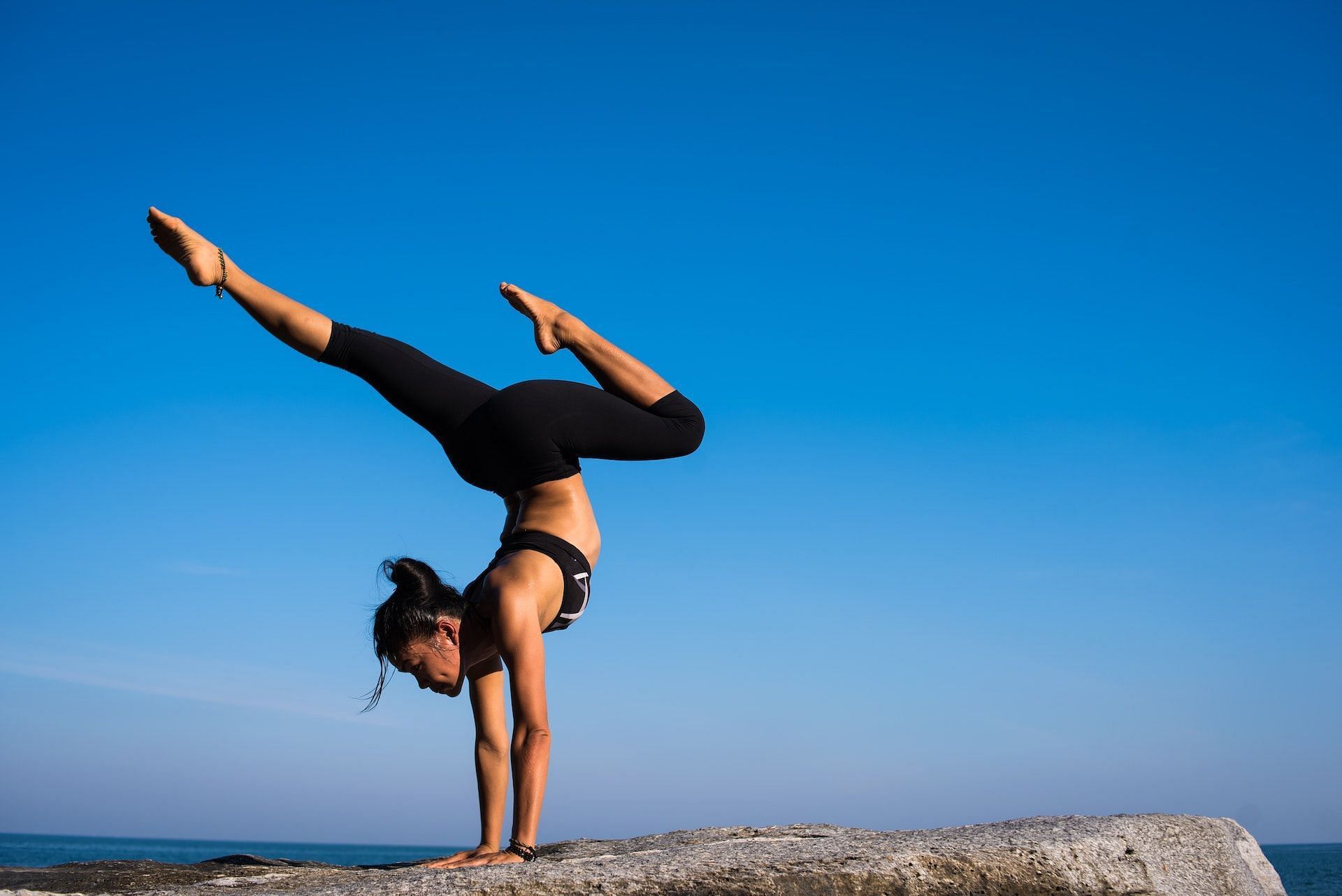 Advanced yoga exercises offer great benefits. (Photo via Pexels/Chevanon Photography)