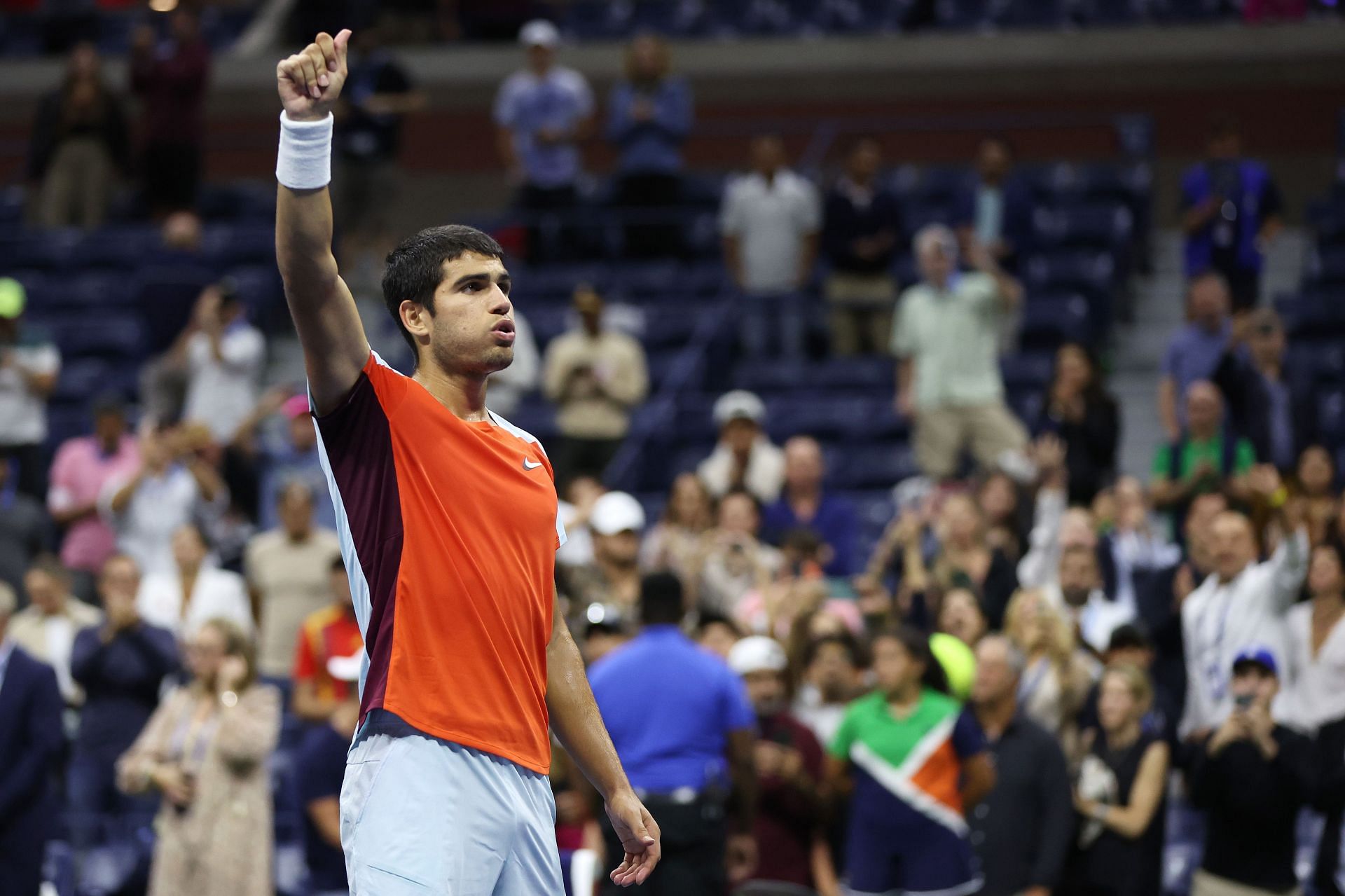 Carlos Alcaraz of Spain celebrates match point against Jannik Sinner at the 2022 US Open