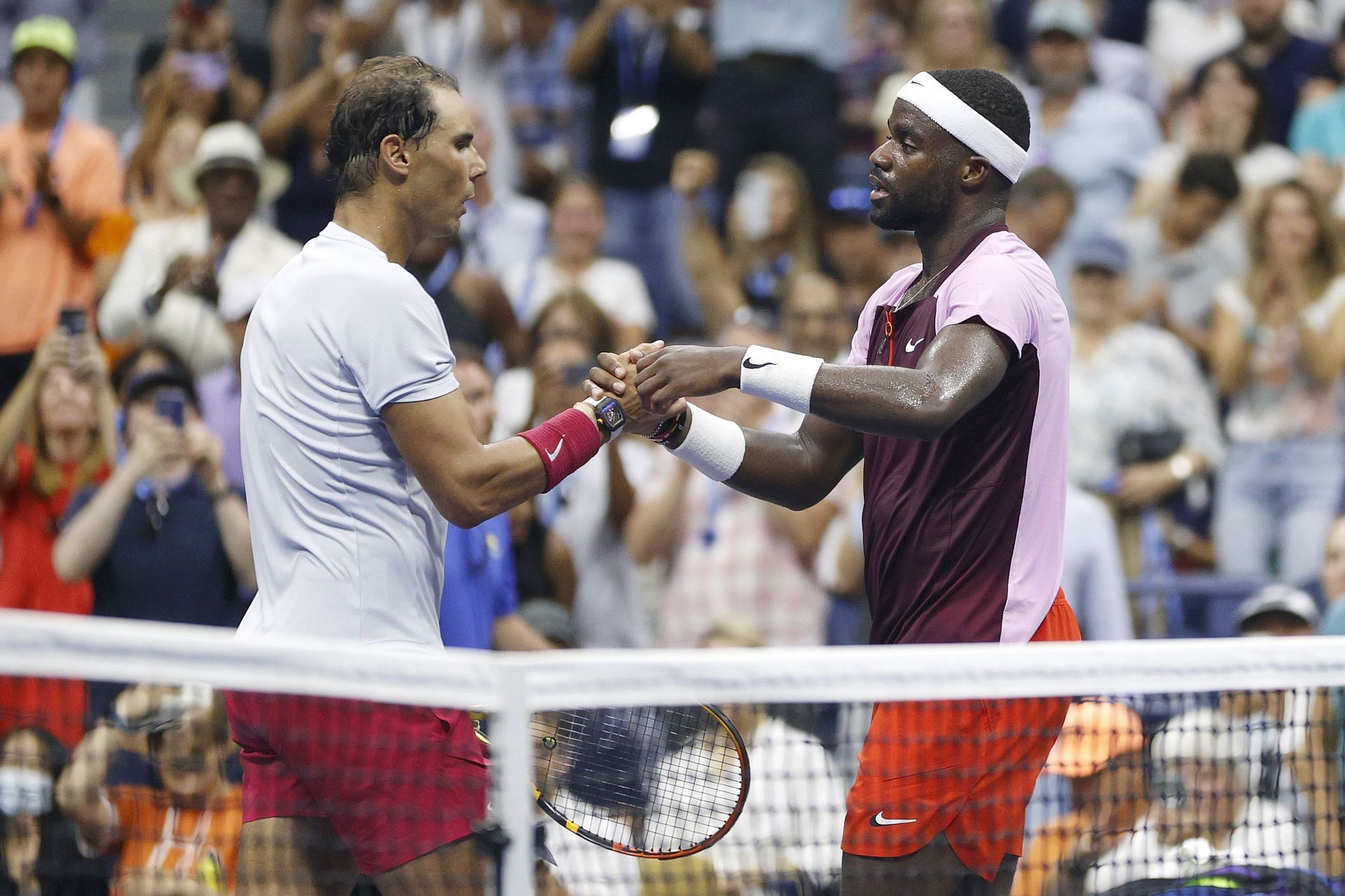 Rafael Nadal (L) and Frances Tiafoe