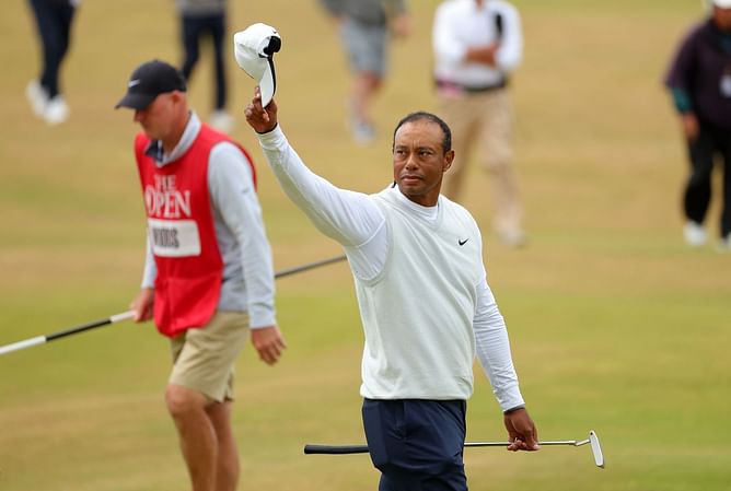 How many different caddies has Tiger Woods had?