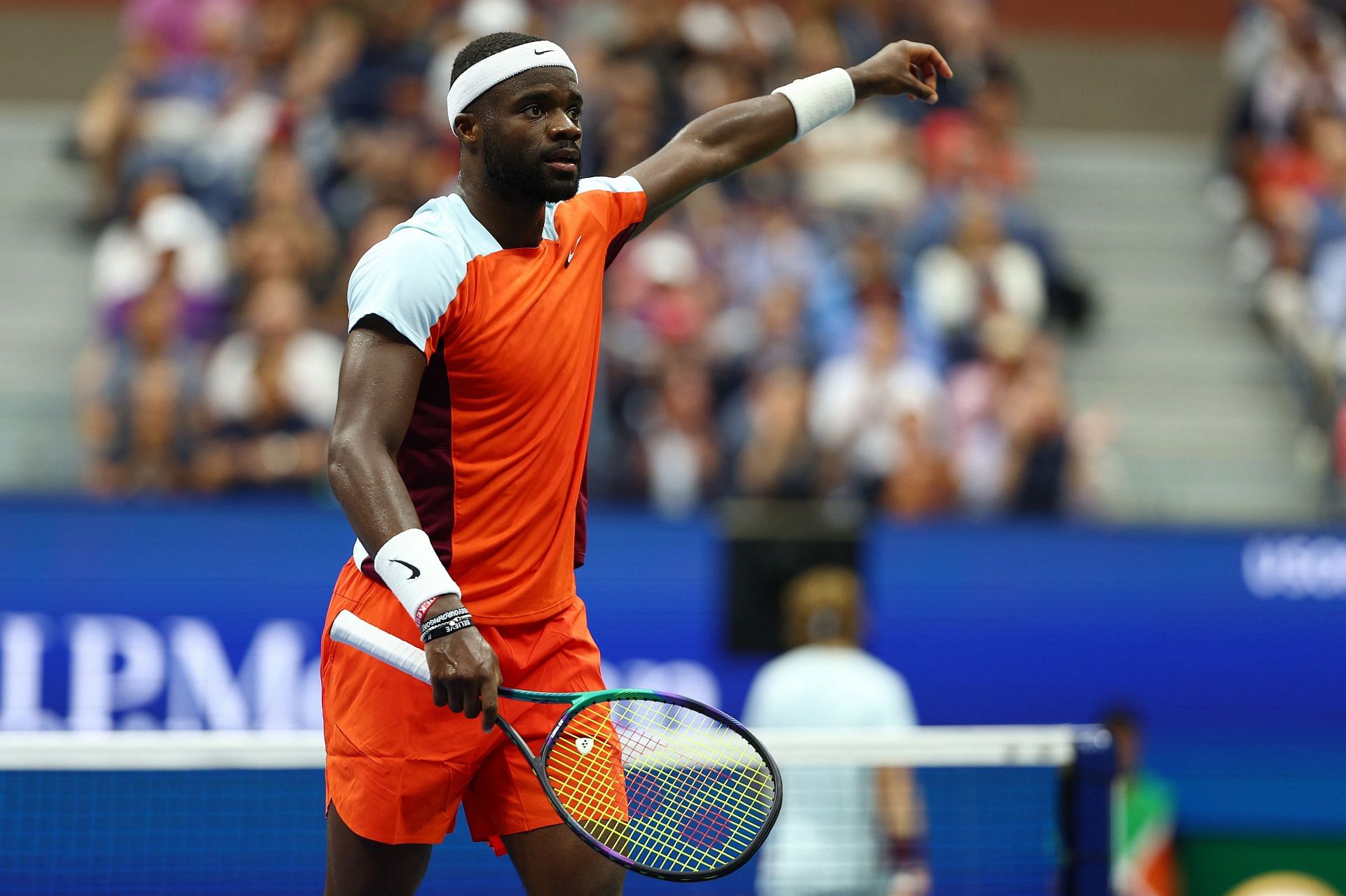 Frances Tiafoe in action against Andrey Rublev in the 2022 US Open.