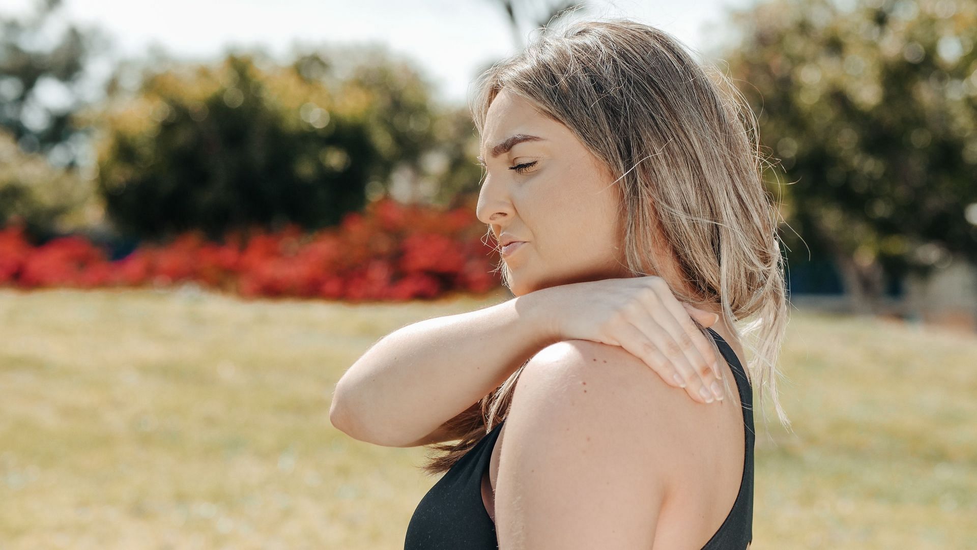 Shoulder pain can be due to tight or strained shoulders (Image via Pexels @Rocketmann Team)