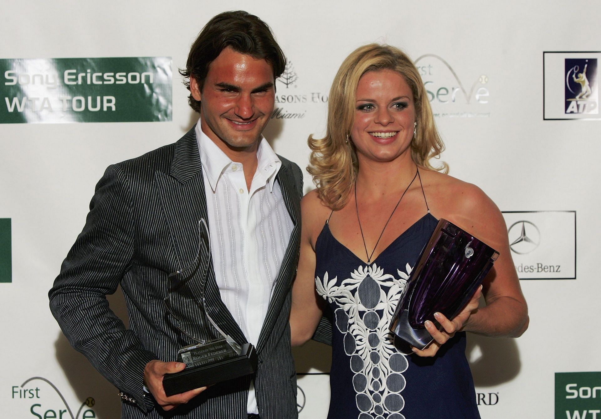 Roger Federer (left) and Kim Clijsters in 2006