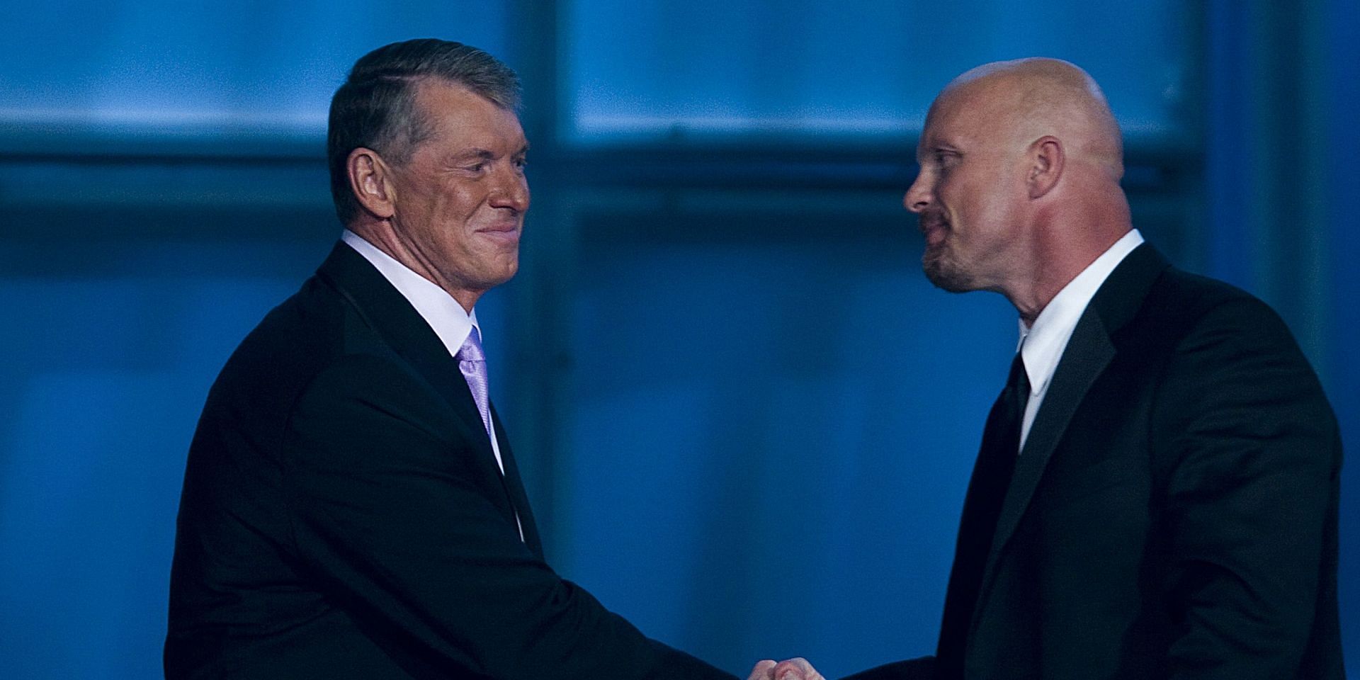 Vince McMahon shaking the hand of &quot;Stone Cold&quot; Steve Austin during his Hall of Fame Ceremony