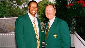 By how many majors is Tiger Woods behind Jack Nicklaus?