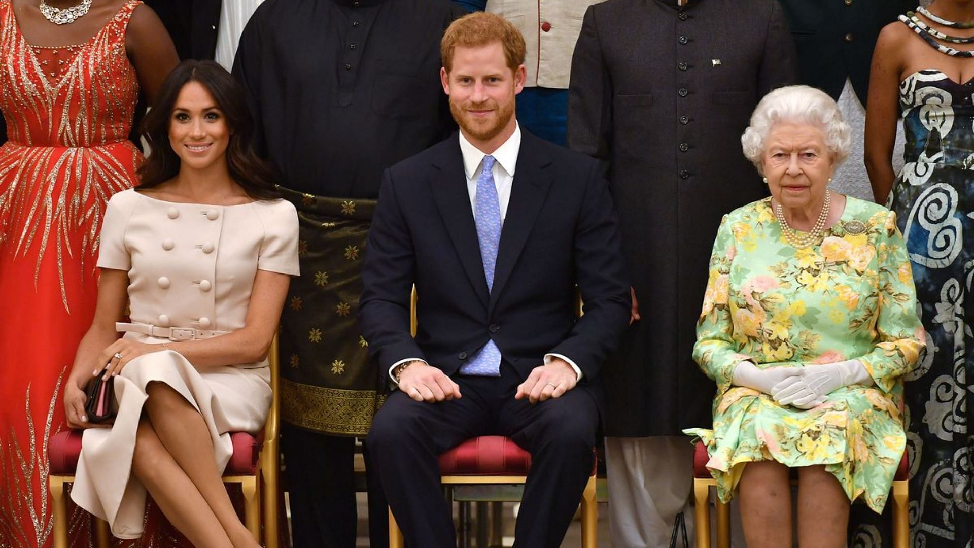 The Duke and Duchess of Sussex along with Queen Elizabeth III. (Image via WPA Pool//Getty Images)