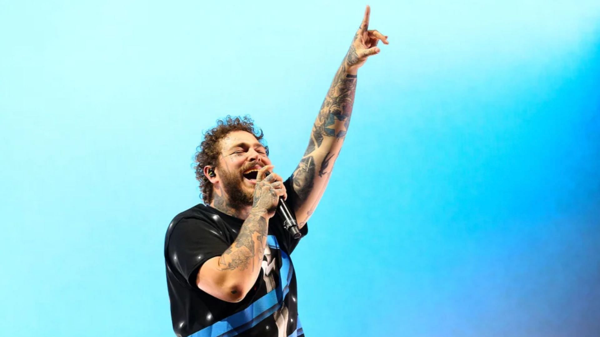 Post Malone recently fell into a hole on stage hurting himself. (Image via Simone Joyner / Getty)