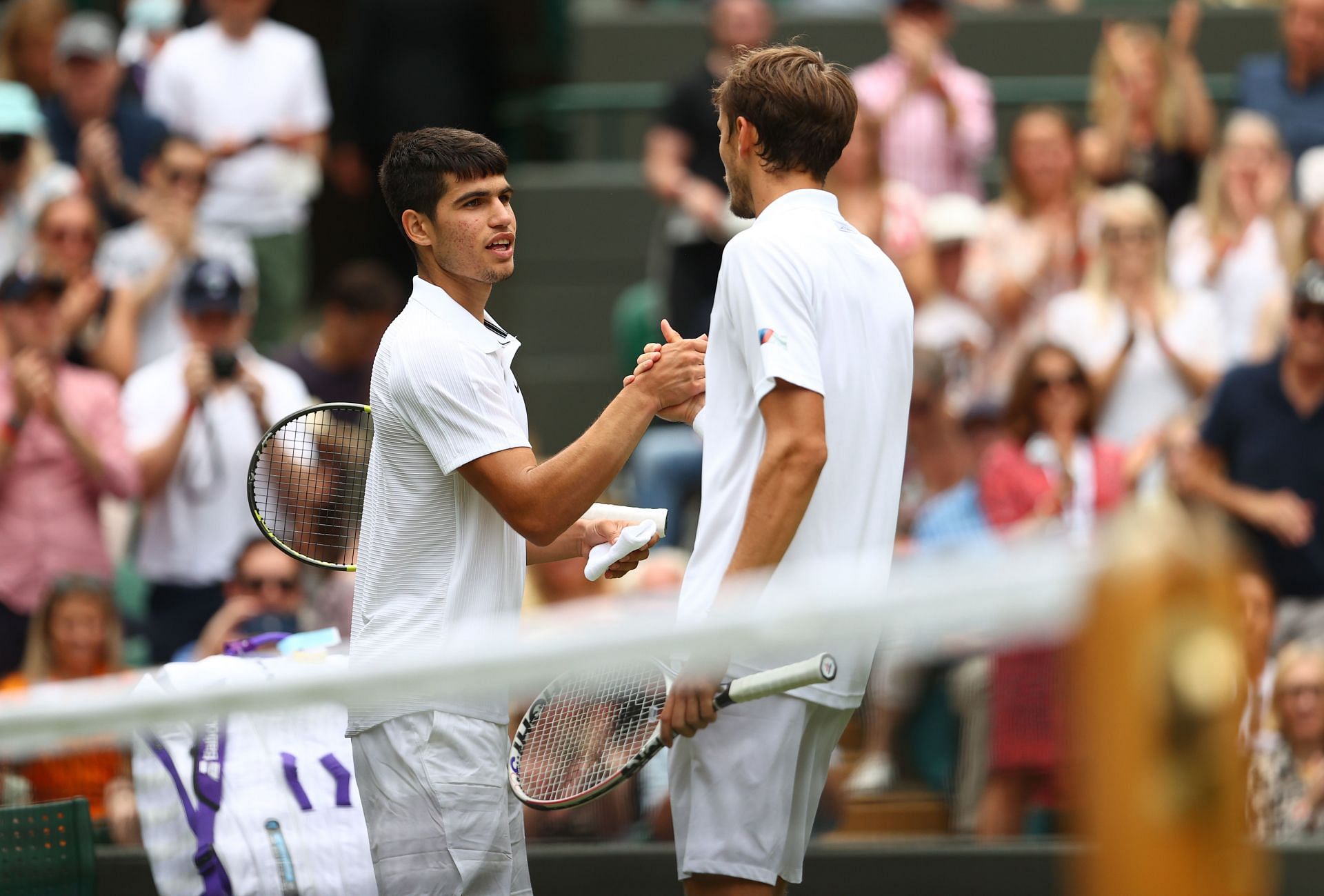 Carlos Alcaraz and Daniil Medvedev at the 2021 Wimbledon Championships