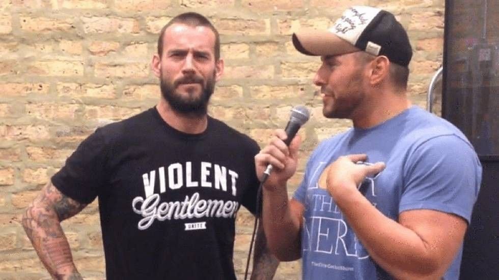 (Left) CM Punk (Right) Colt Cabana