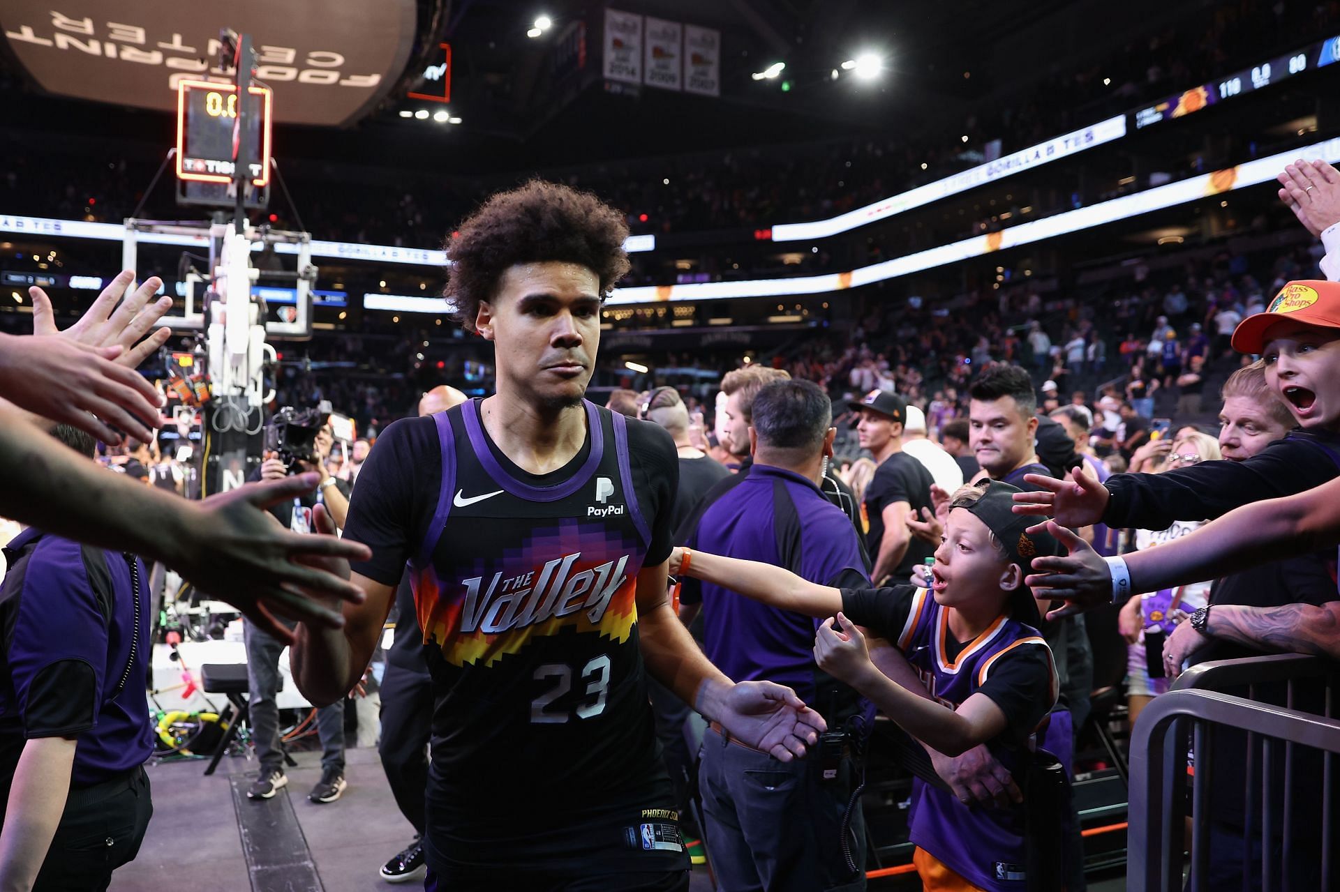 Cam Johnson walks off the court