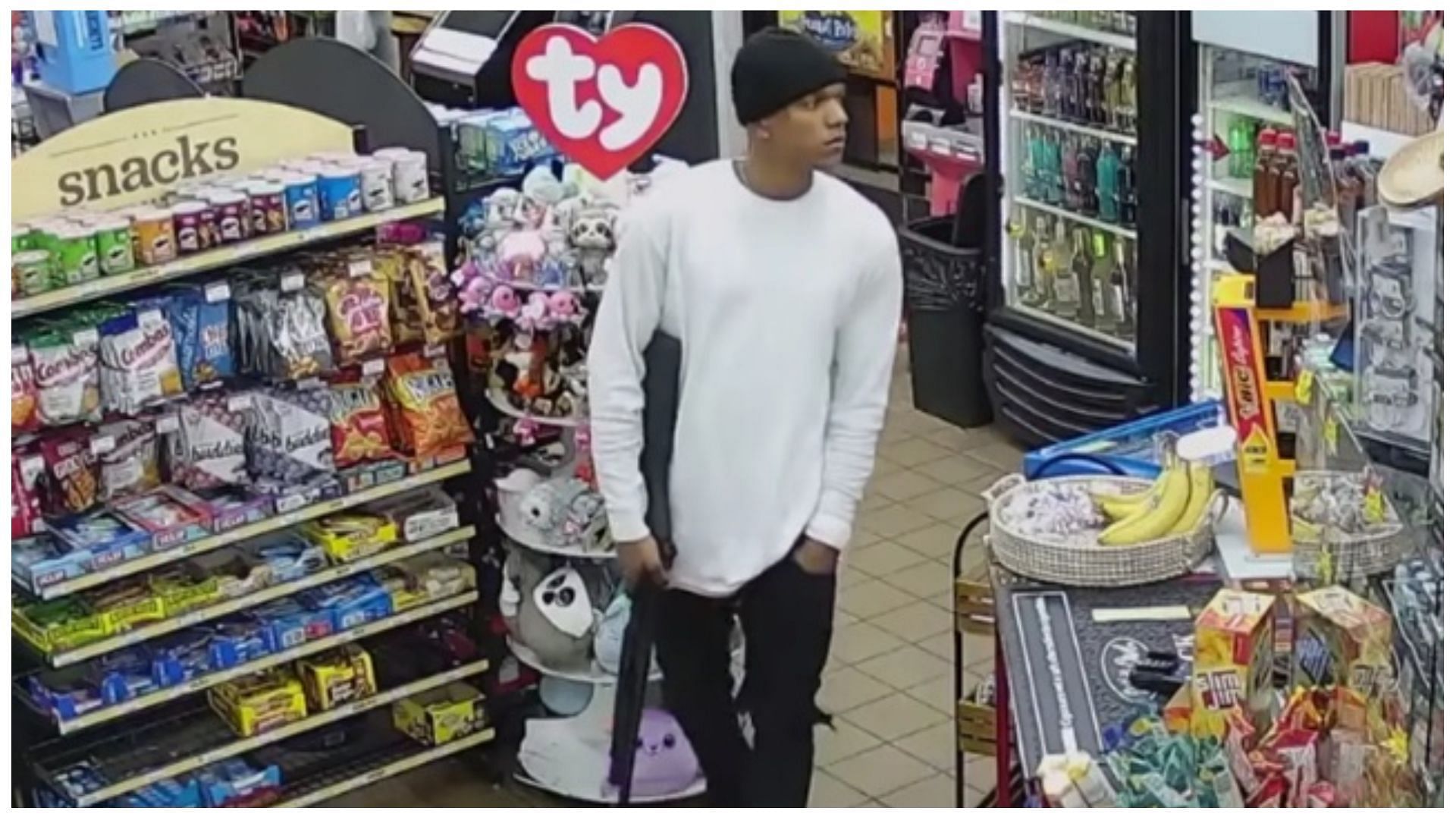 A Chicago armed robber casually walking into Florida convenience store (Image via Escambia County Sheriff