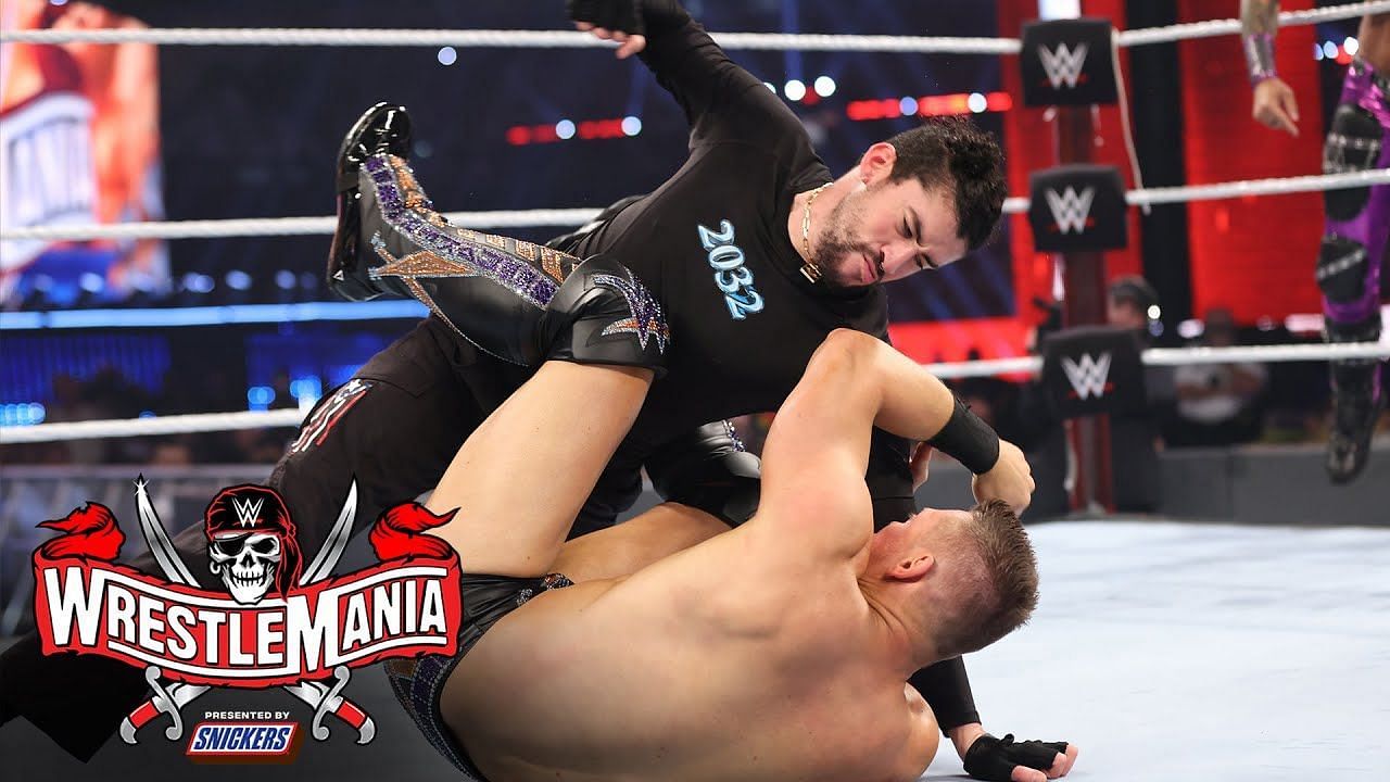 Bad Bunny punching The Miz during their WrestleMania 37 match.