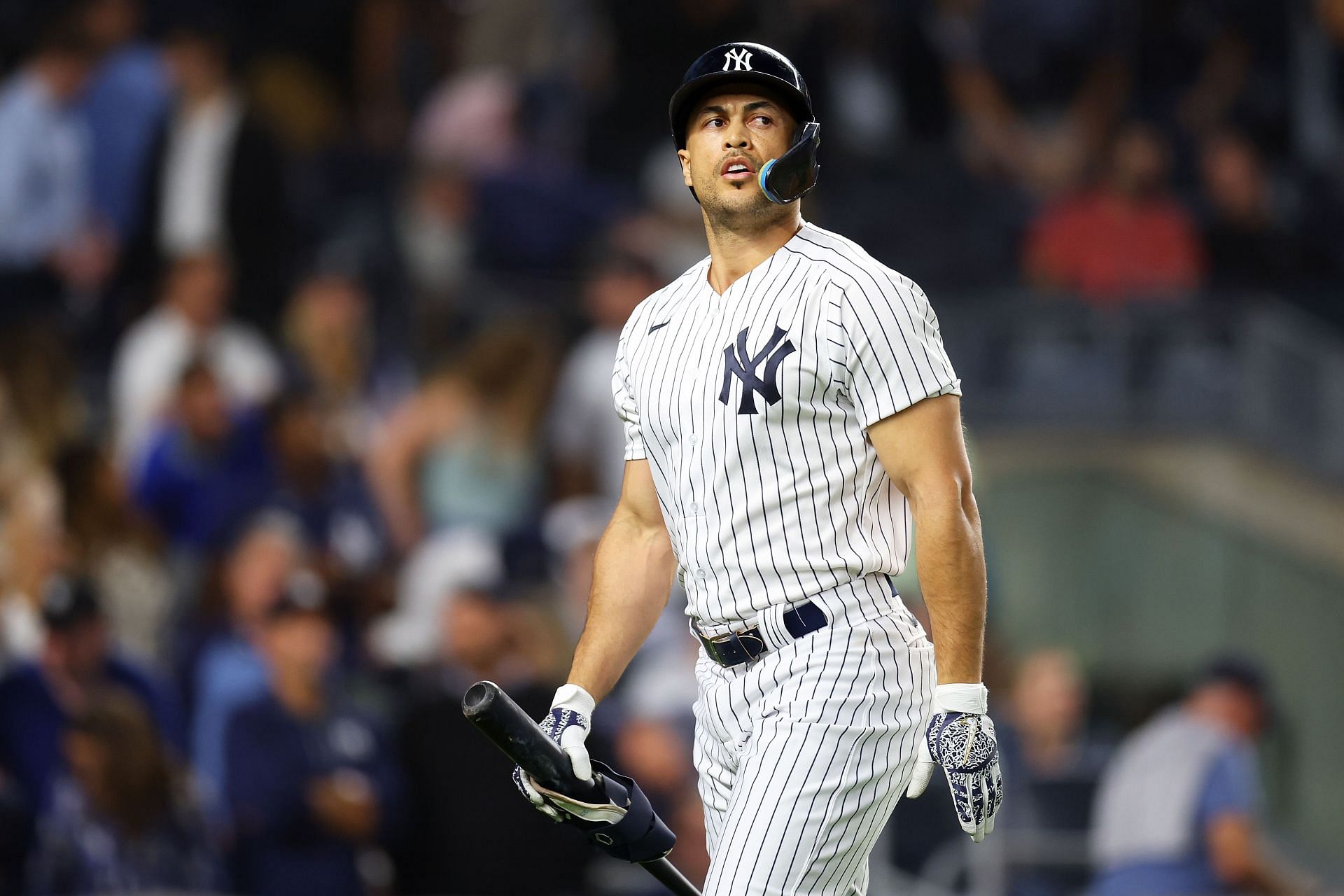 Giancarlo Stanton #27 of the New York Yankees reacts after striking out