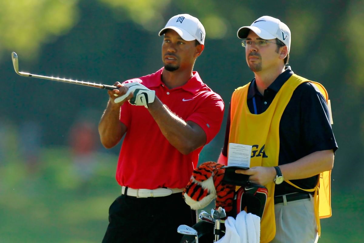 How many different caddies has Tiger Woods had?