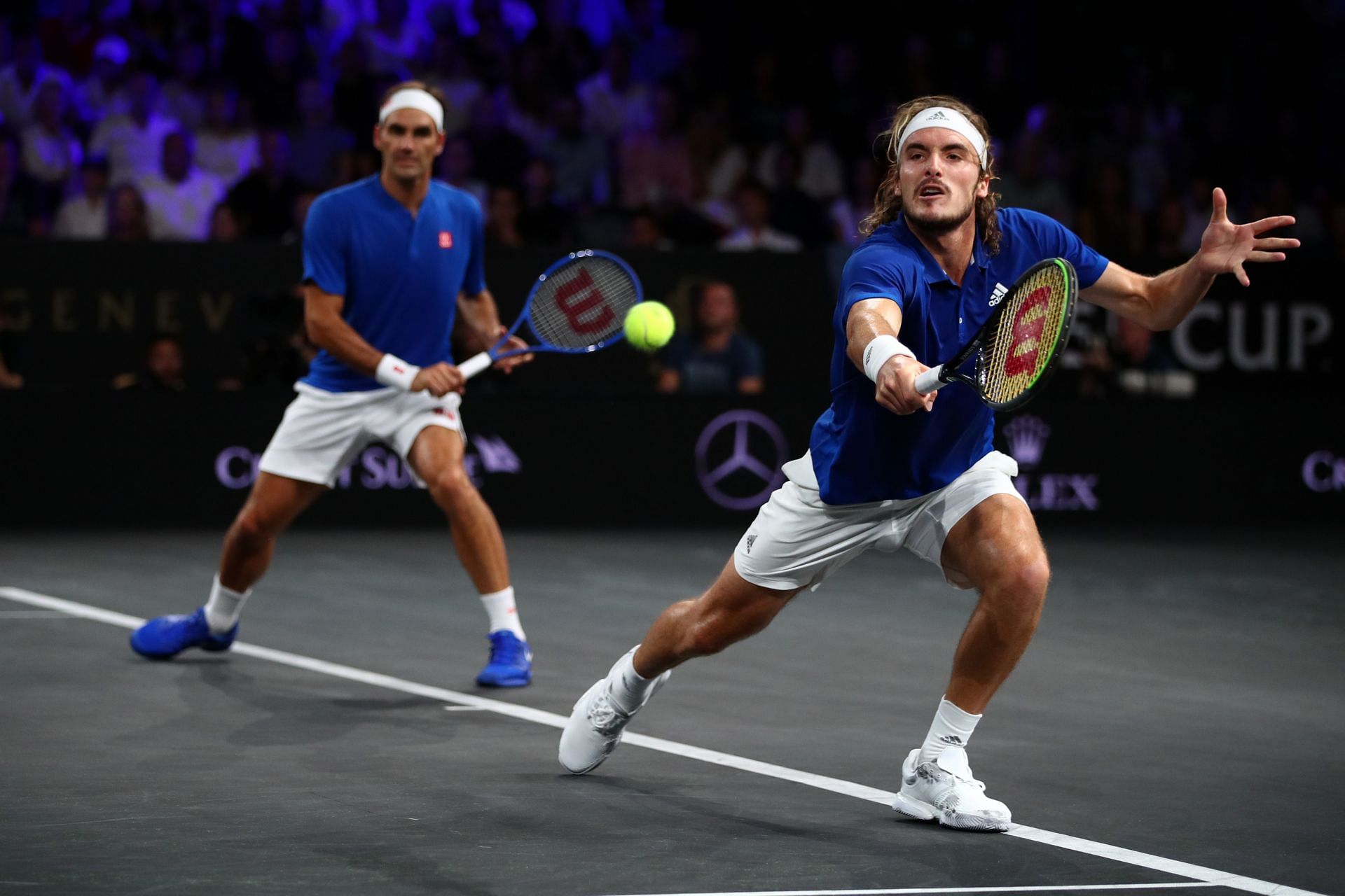  Federer (L) &amp; Tsitsipas in action at the Laver Cup 2019