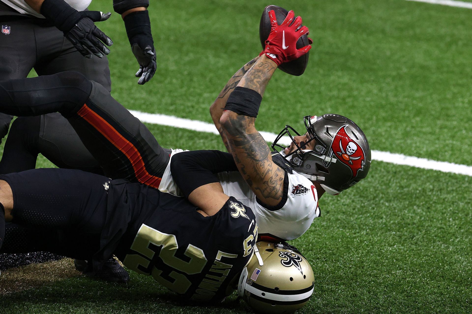 Benches clearing Saints-Bucs brawl involving Tom Brady leads to ejections  for Mike Evans, Marshon Lattimore