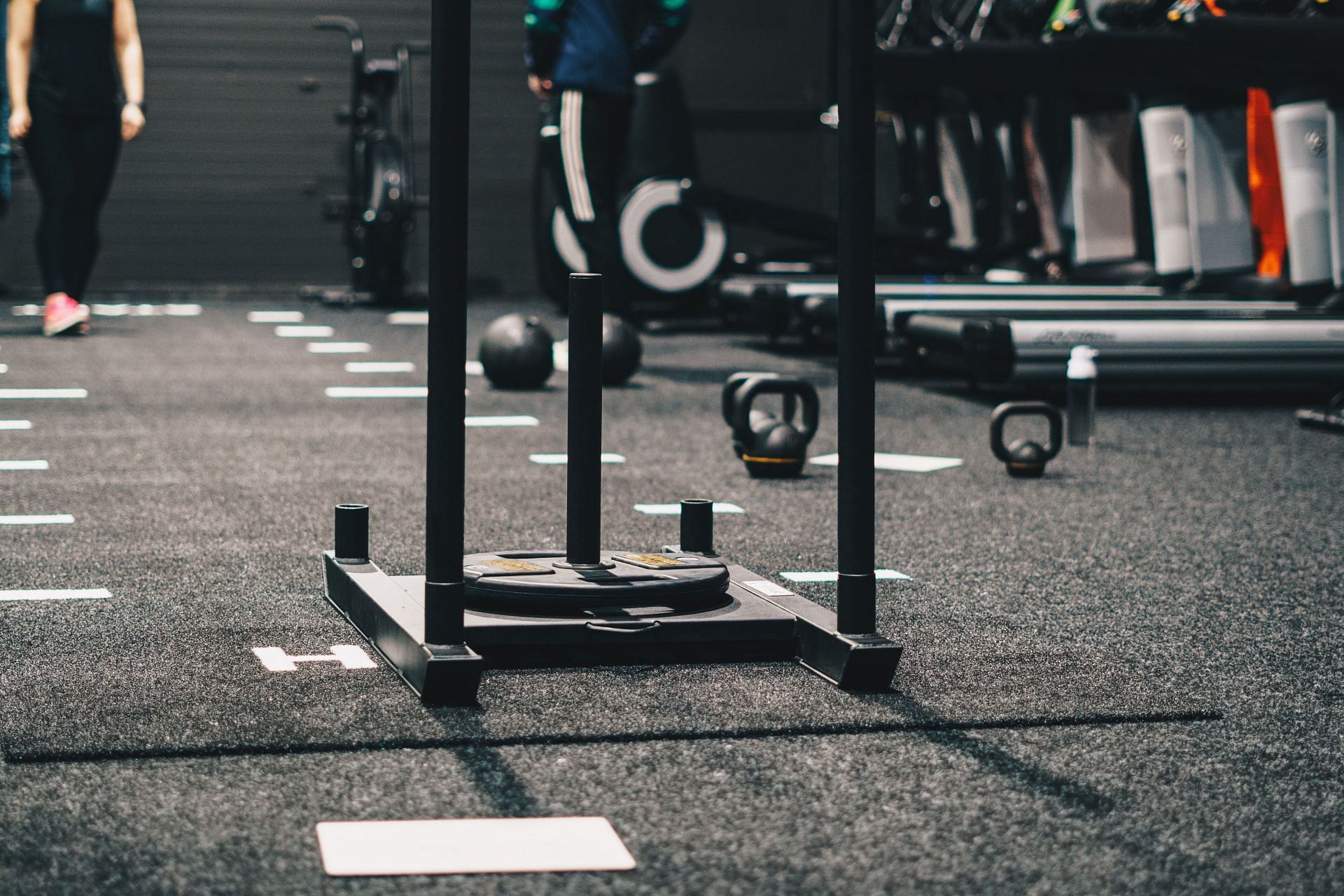 Sled push exercises are a good way to build muscular strength (Image via Unsplash @ Ambitious Creative)