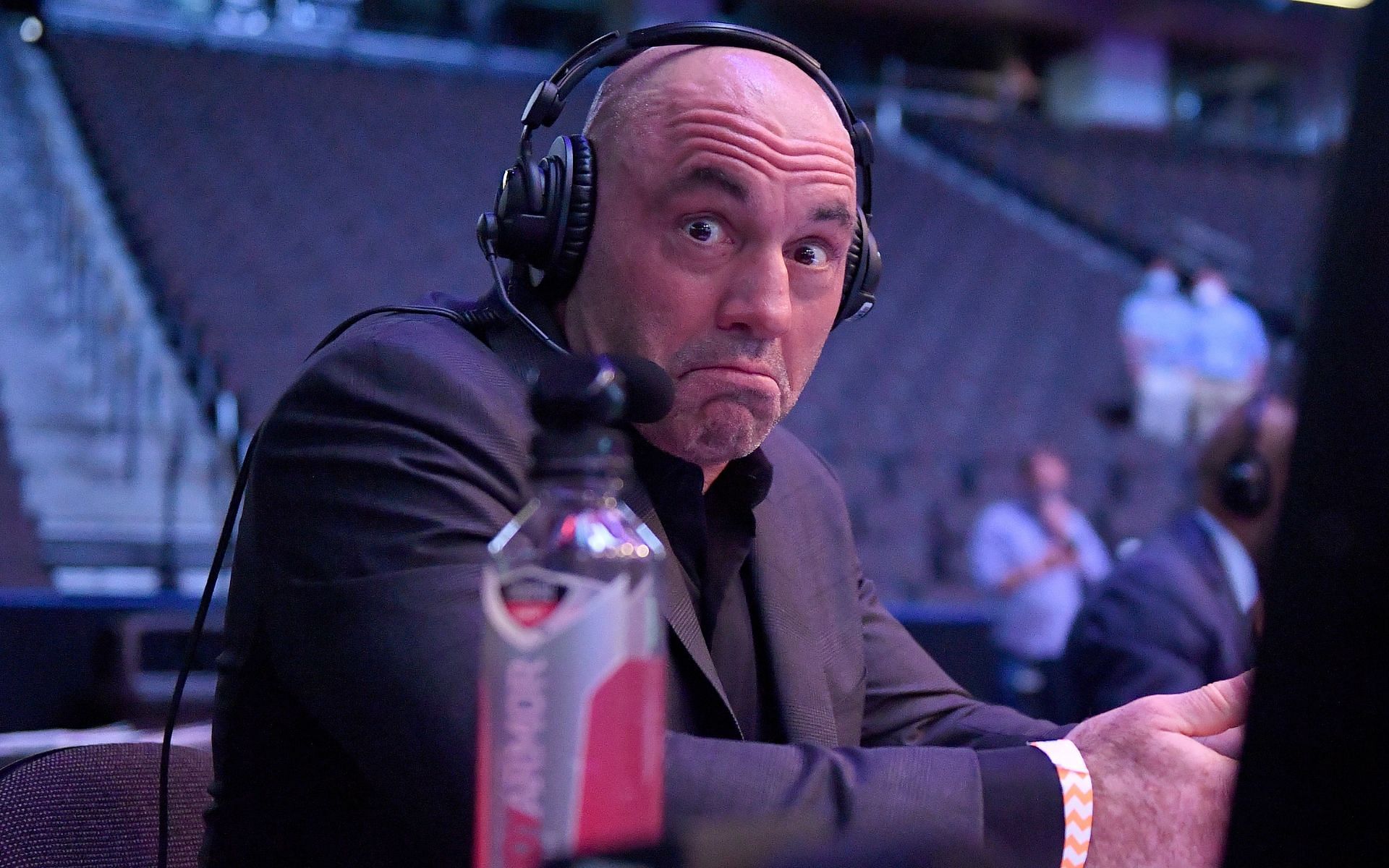 Joe Rogan at the commentary booth during UFC 249 