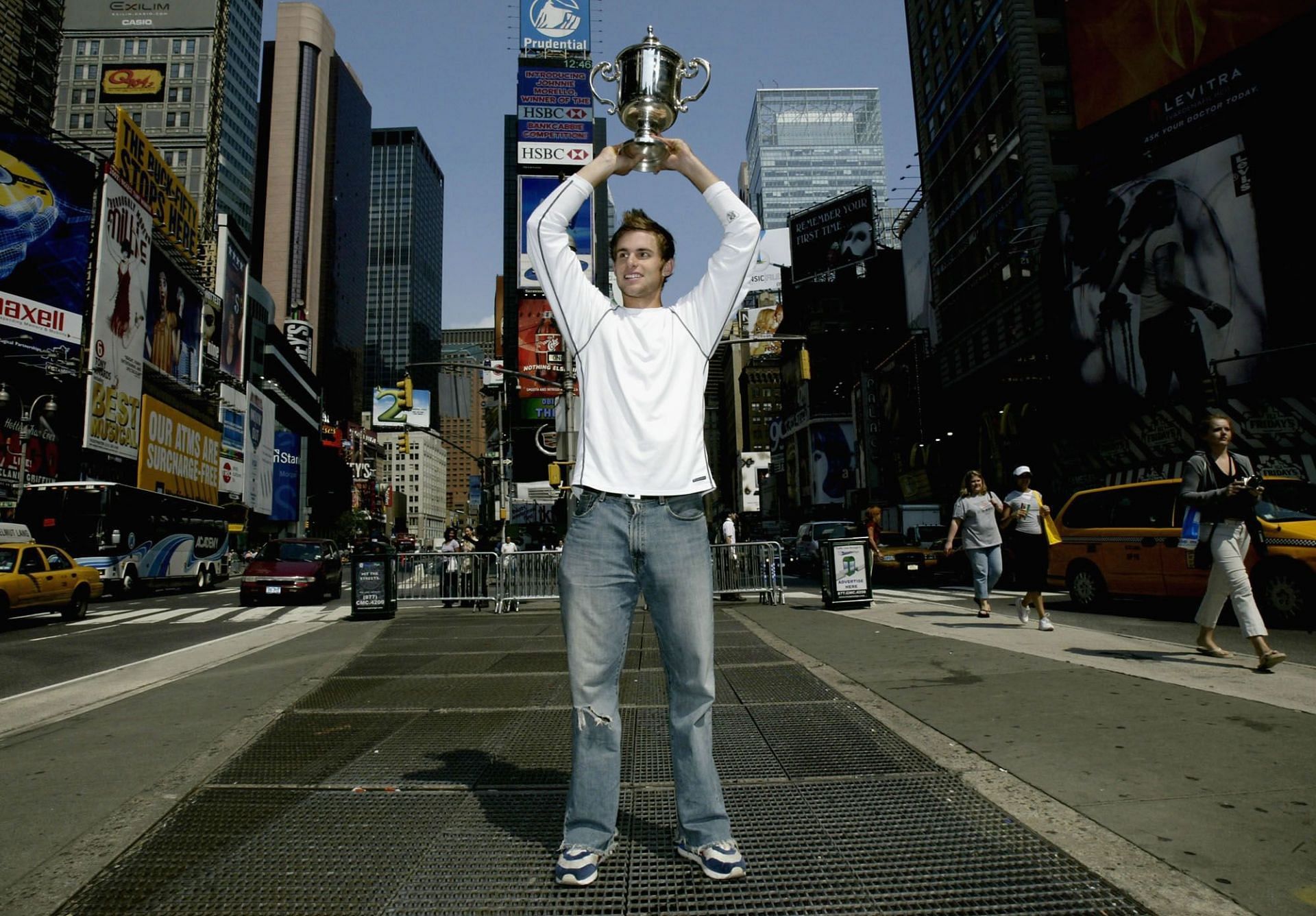Andy Roddick poses in Times Square after his US Open win.