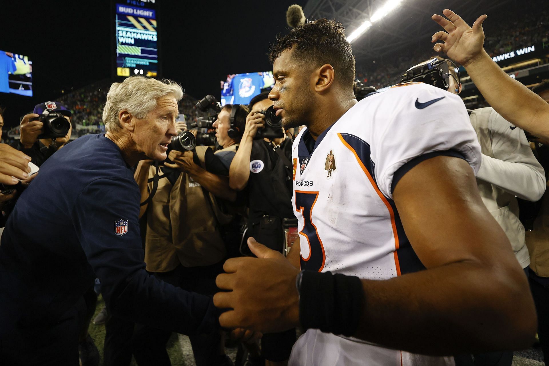 Russell Wilson has yet to settle with the Denver Broncos