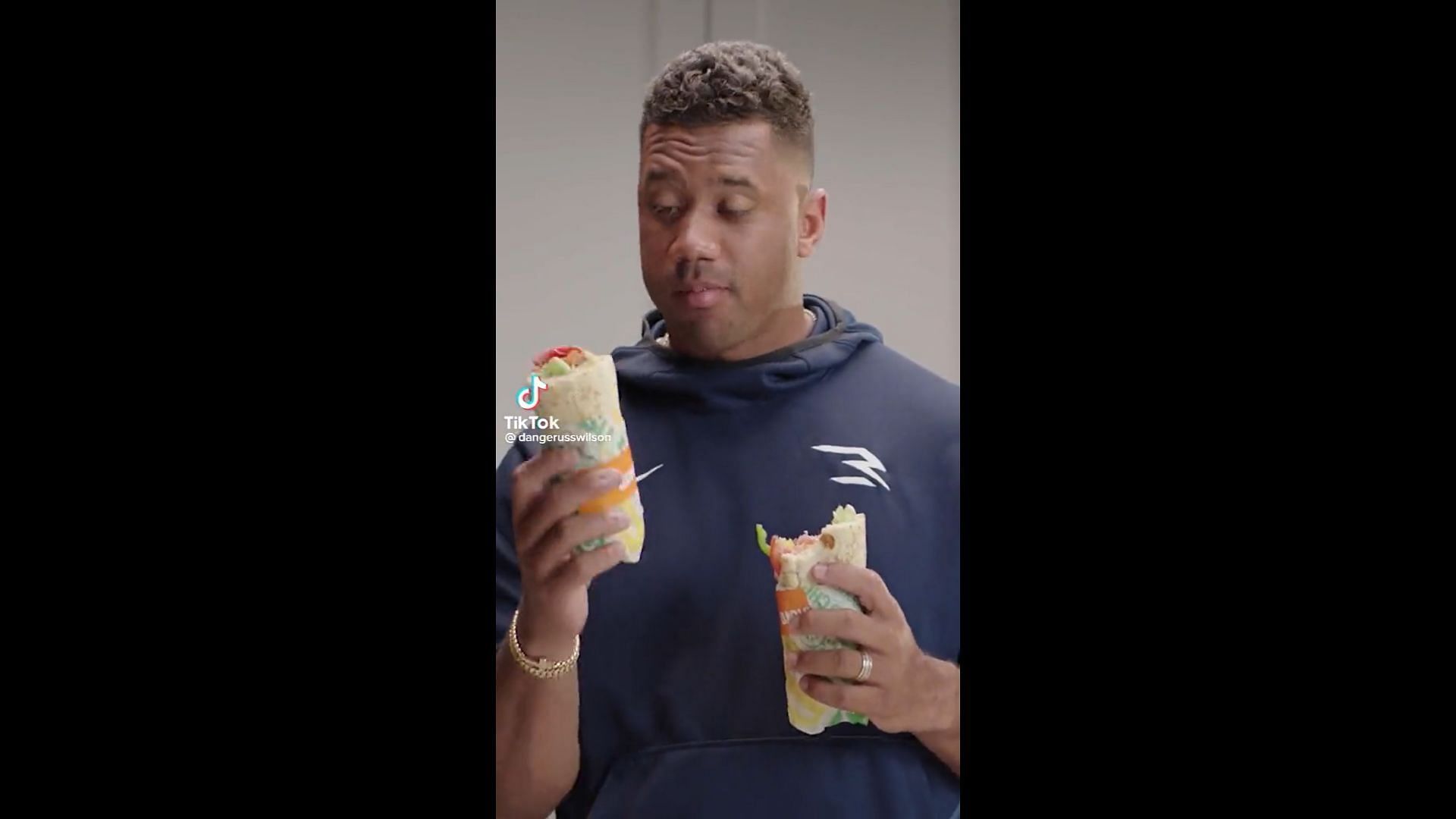 Wilson during his subway commercial. Phot via Russell Wilson/TikTok