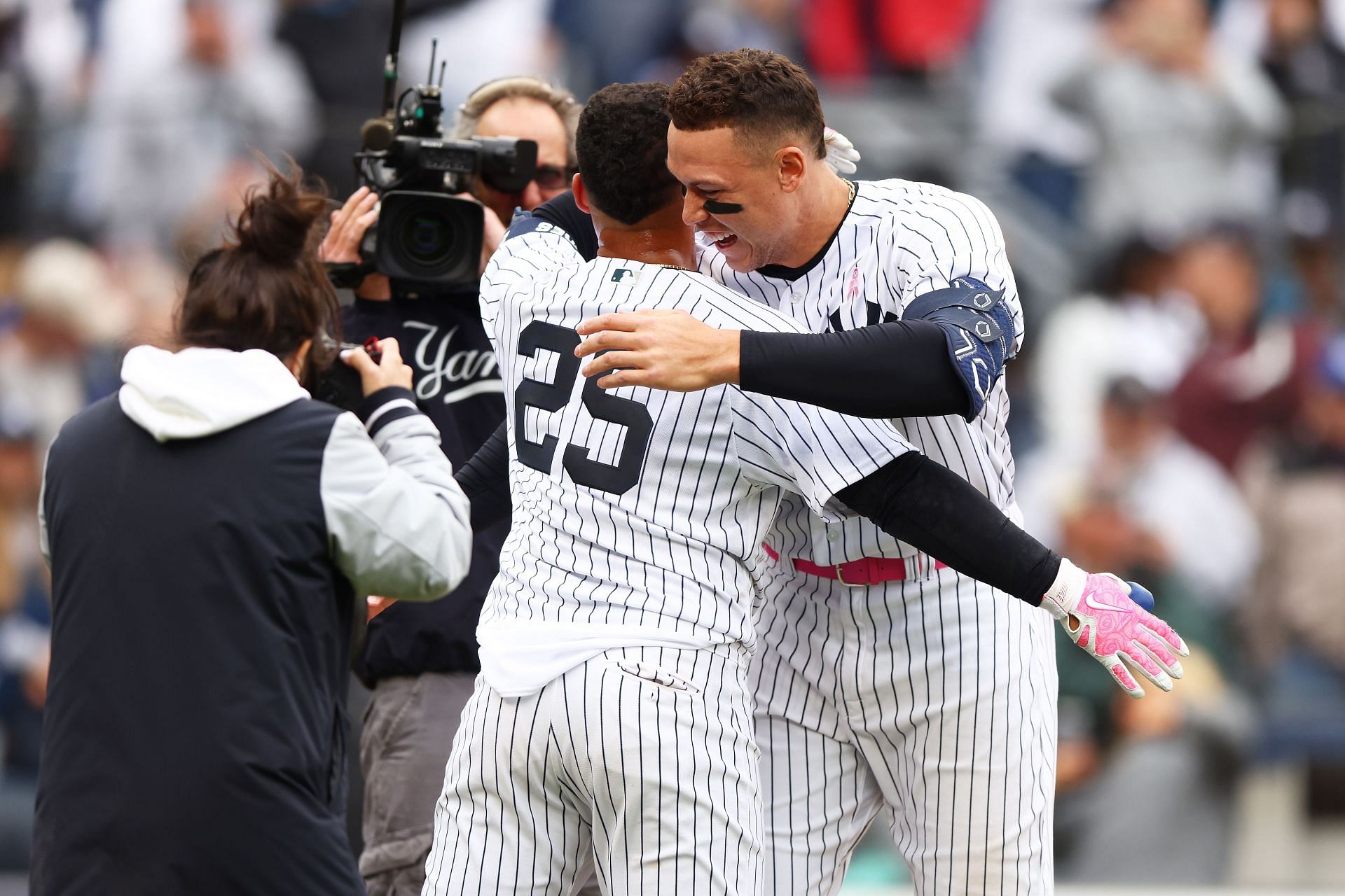 Gleyber Torres celebrates with Aaron Judge after hitting a walk-off home run against the Texas Rangers.