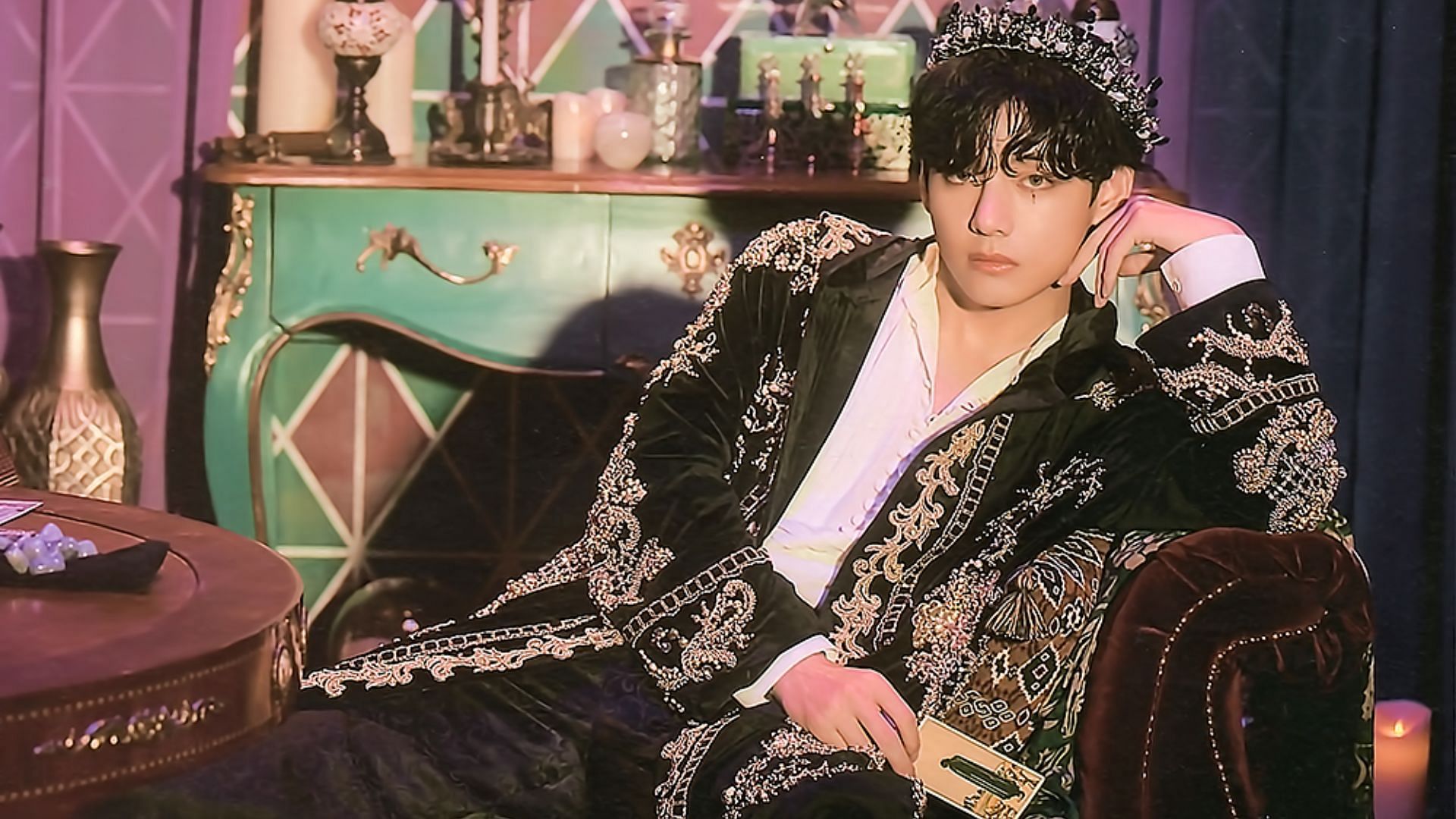 V looking like royalty in his purple robe (Image via BIGHIT MUSIC)