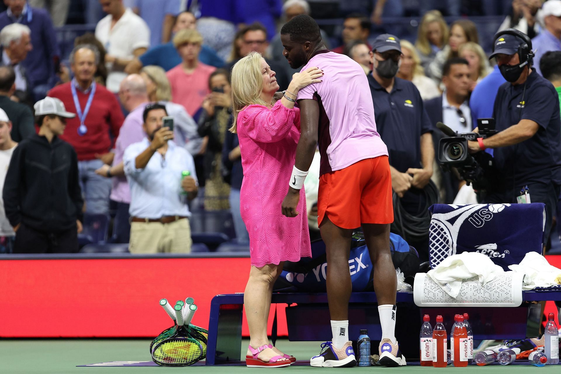 Frances Tiafoe with US Open tournament director Stacey Allaster
