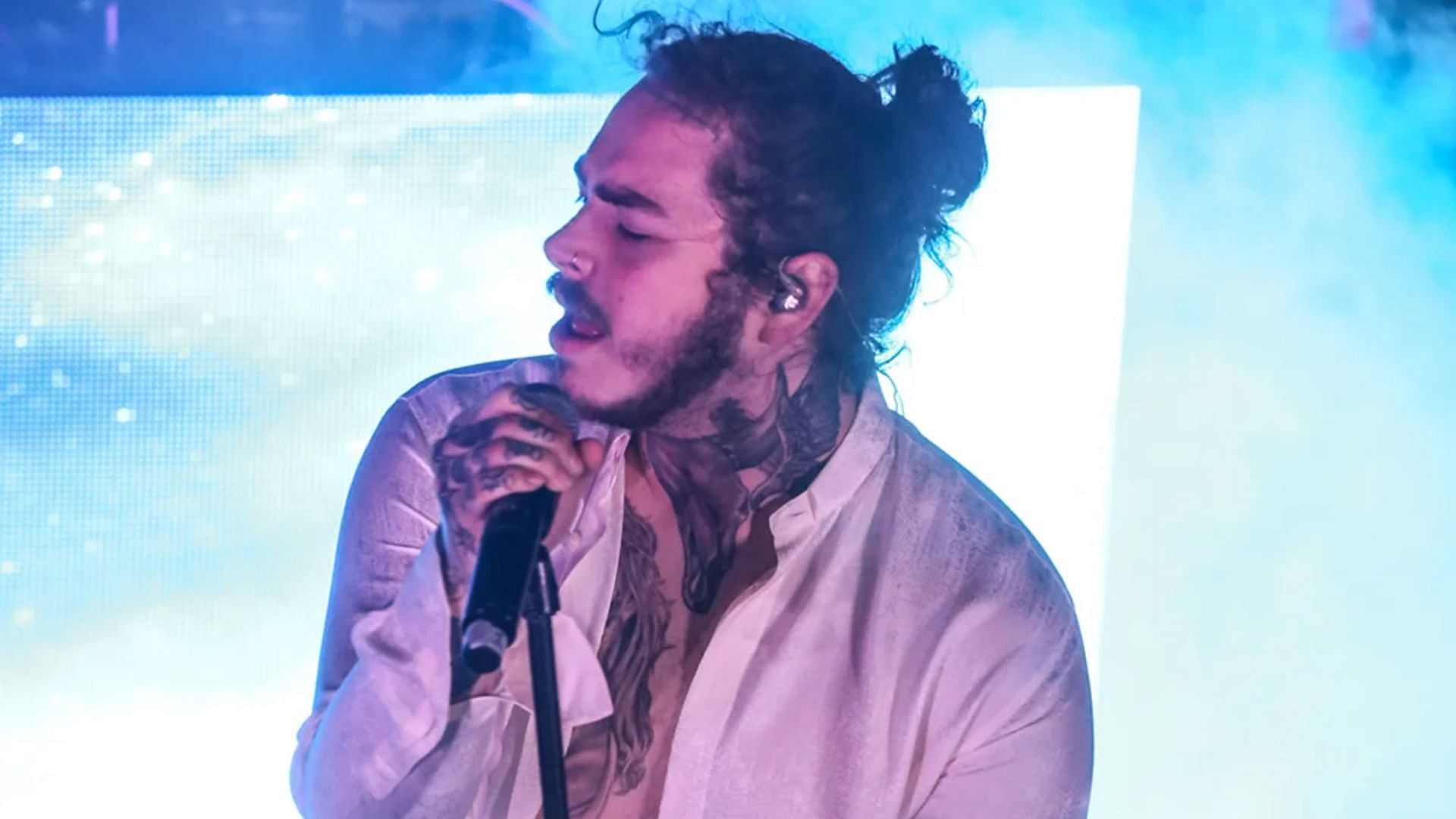 Post Malone accidentally falls through an onstage trap door. (Image via Getty Images/Thaddaeus McAdams)