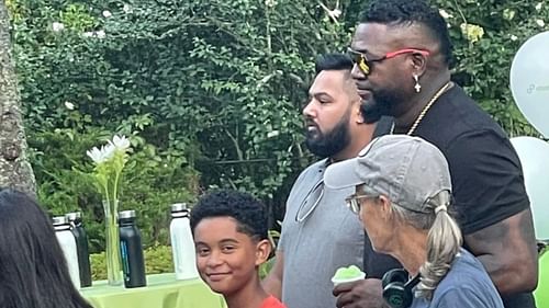 Aviyen Merced with his family and David Ortiz.